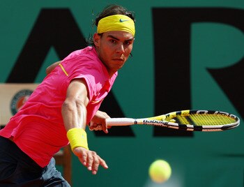 PARIS - MAY 31:  Rafael Nadal of Spain hits a forehand during the Men's Singles Fourth Round match against Robin Soderling of Sweden on day eight of the French Open at Roland Garros on May 31, 2009 in Paris, France.  (Photo by Clive Brunskill/Getty Images
