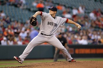 BALTIMORE, MD - APRIL 28:  Starting pitcher Jon Lester #31 of the Boston Red Sox delivers to a Baltimore Orioles batter at Oriole Park at Camden Yards on April 28, 2011 in Baltimore, Maryland.  (Photo by Rob Carr/Getty Images)