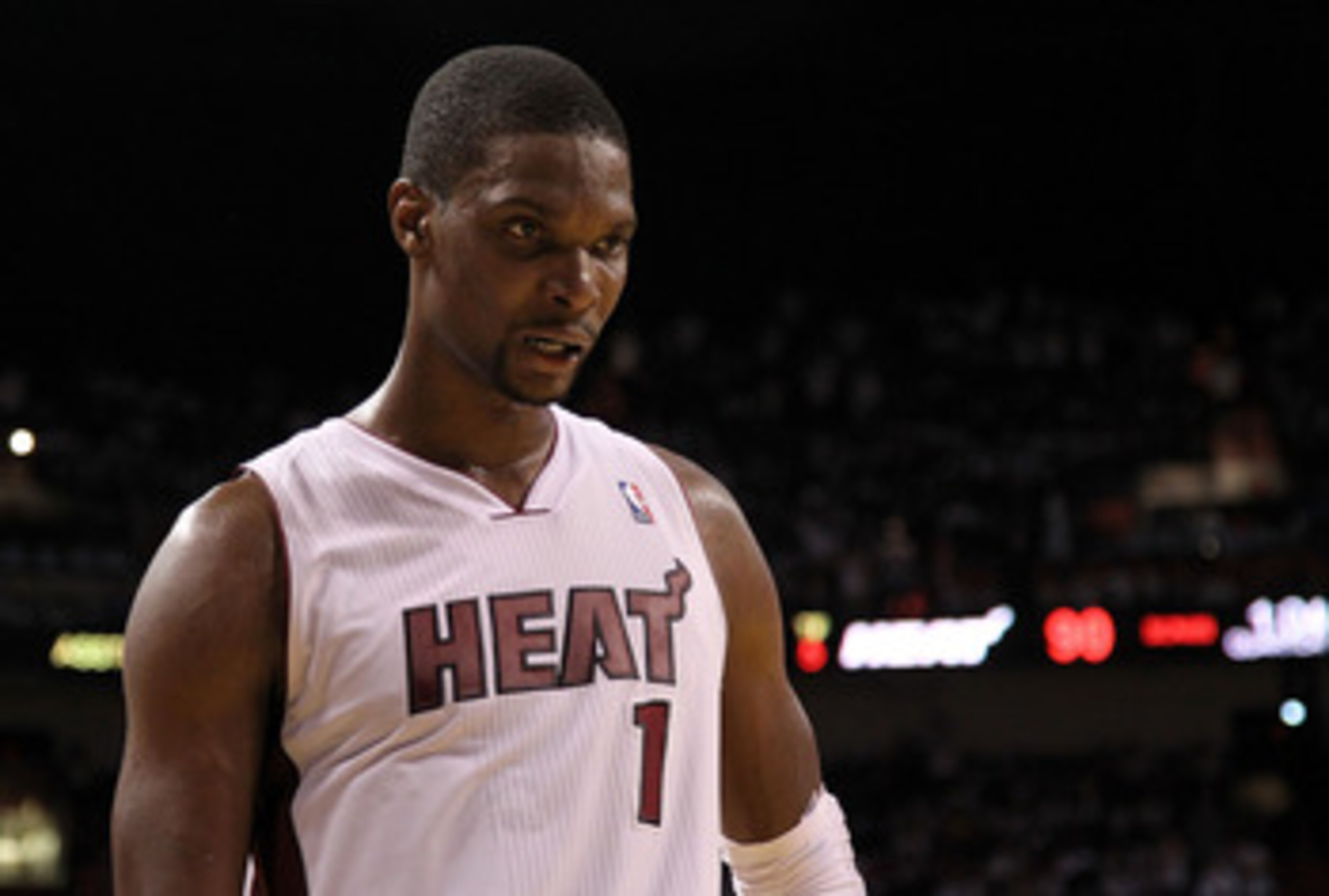 MIAMI, FL - APRIL 27: Chris Bosh #1 of the Miami Heat looks on during game five of the Eastern Conference Quarterfinals in the 2011 NBA Playoffs against the Philadelphia 76ers at American Airlines Arena on April 27, 2011 in Miami, Florida. NOTE TO USER: U