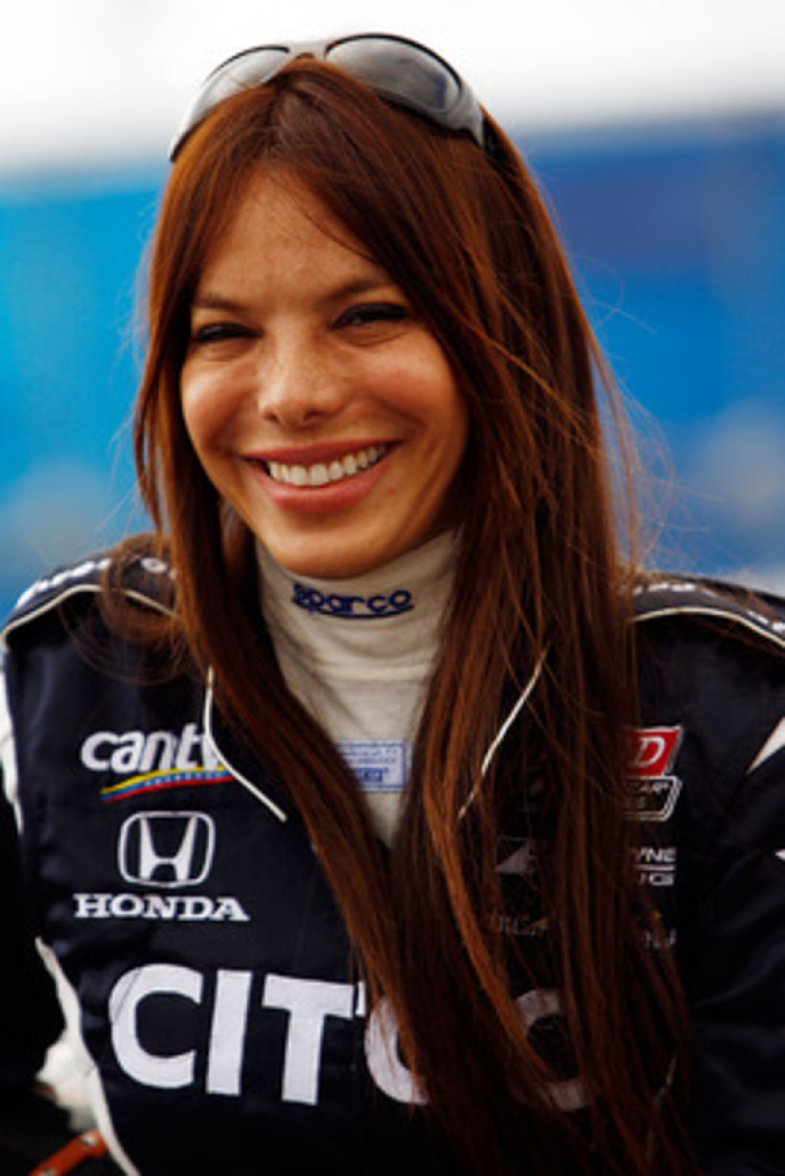 ST PETERSBURG, FL - MARCH 26: Milka Duno of Venezuela, driver of the #18 CITGO Dale Coyne Racing Dallara Honda, prepares to drive before practice for the IndyCar Series Honda Grand Prix of St. Petersburg on March 26, 2010 in St Petersburg, Florida. (Pho ST PETERSBURG, FL - MARCH 26: Milka Duno of Venezuela, driver of the #18 CITGO Dale Coyne Racing Dallara Honda, prepares to drive before practice for the IndyCar Series Honda Grand Prix of St. Petersburg on March 26, 2010 in St Petersburg, Florida. (Pho