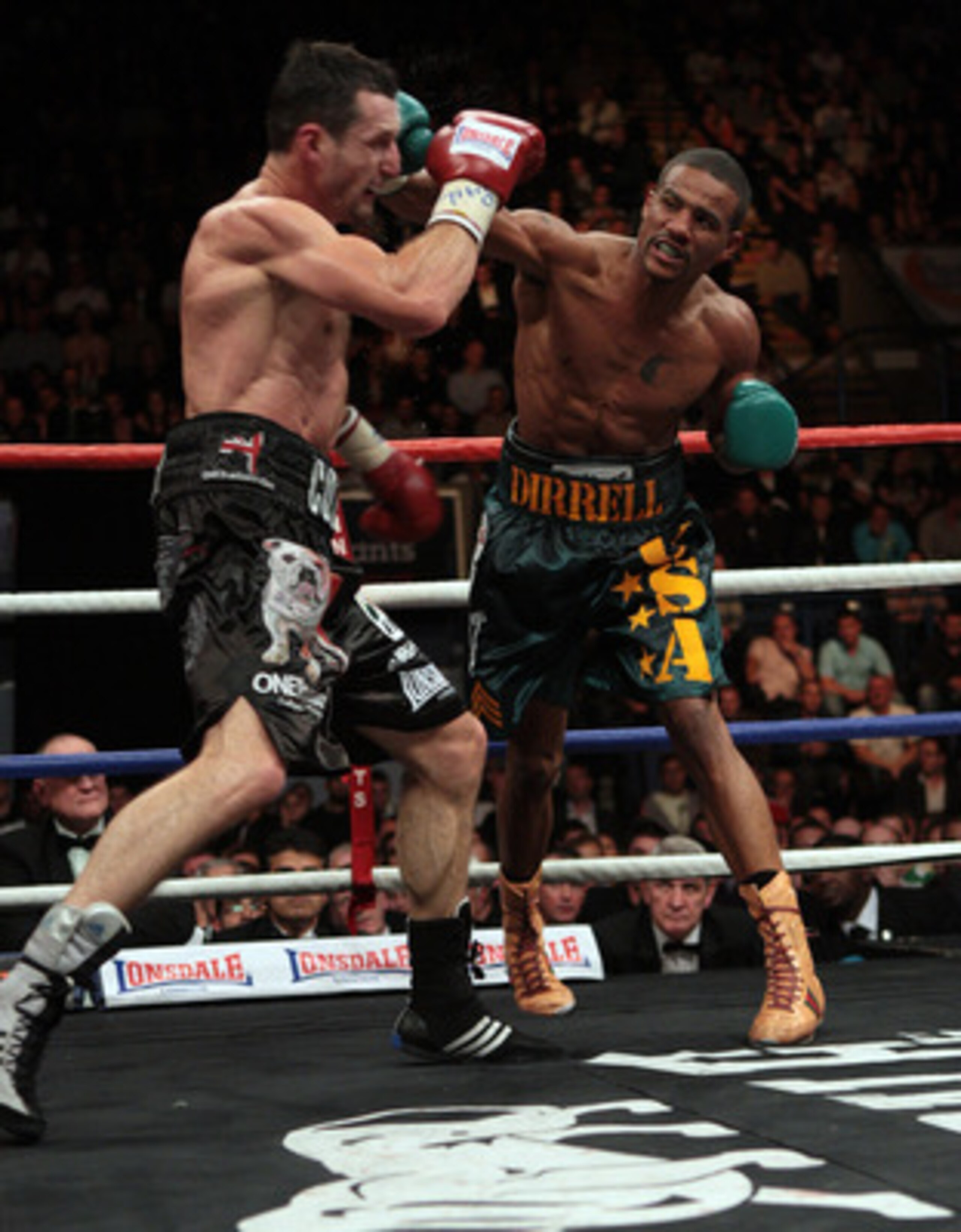 NOTTINGHAM, ENGLAND - OCTOBER 17: Carl Froch (L) is caught by a right cross in his title against Andre Dirrell during their WBC Super Middleweight fight on October 17, 2009 at Trent FM Arena in Nottingham, England. (Photo by John Gichigi/Getty Images) NOTTINGHAM, ENGLAND - OCTOBER 17: Carl Froch (L) is caught by a right cross in his title against Andre Dirrell during their WBC Super Middleweight fight on October 17, 2009 at Trent FM Arena in Nottingham, England. (Photo by John Gichigi/Getty Images)