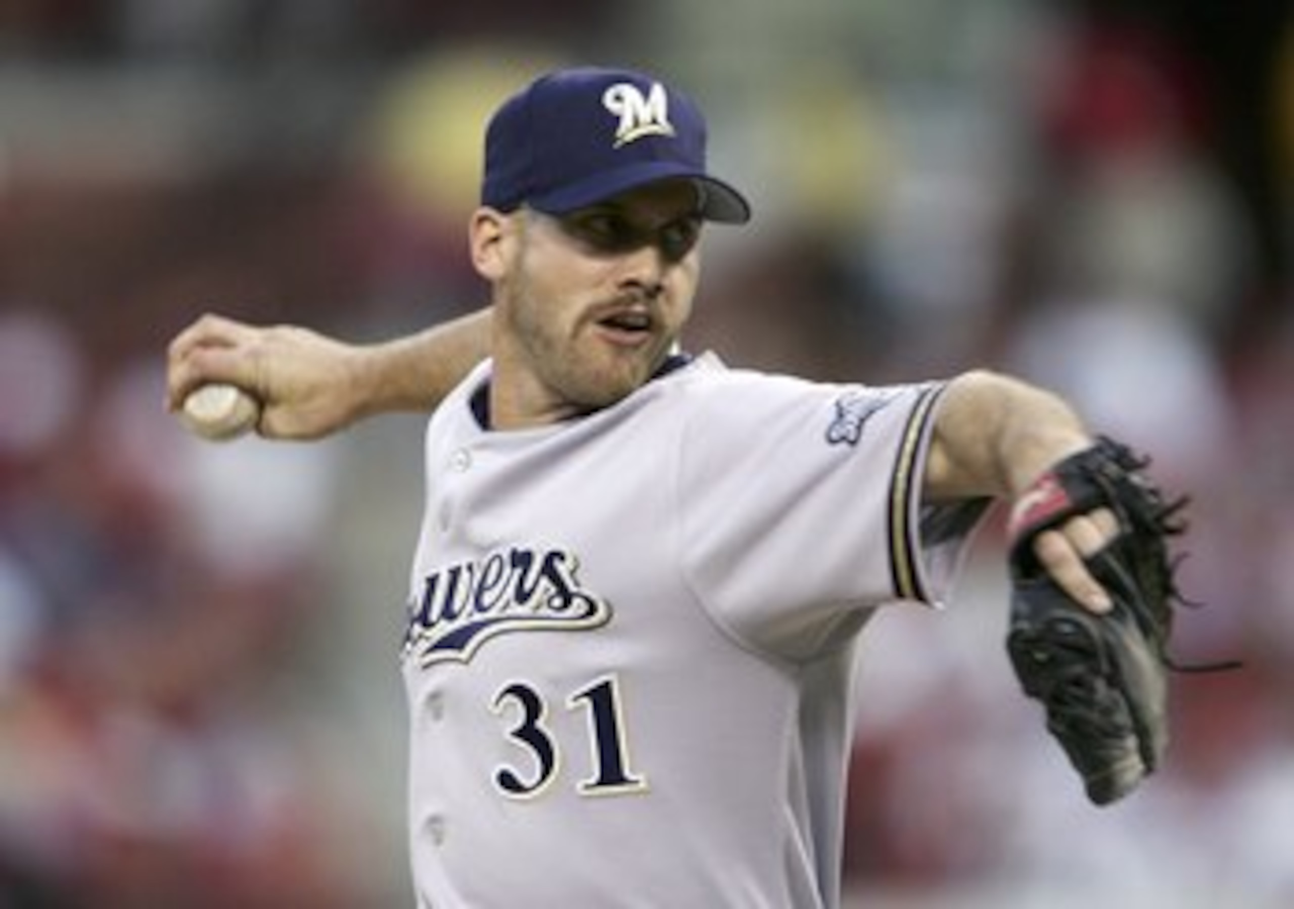 ST. LOUIS, MISSOURI - APRIL 12:  David Bush #31 of the Milwaukee Brewers delivers a pitch against the St. Louis Cardinals in the 1st inning on April 12, 2006 at the Busch Stadium in St. Louis, Missouri.  (Photo by Elsa/Getty Images)