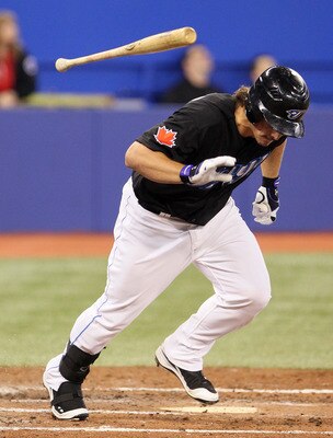 TORONTO, CANADA - APRIL 7: Travis Snider #45 of the Toronto Blue Jays throws his bat during MLB action between the Toronto Blue Jays and the Oakland Athletics at the Rogers Centre April 7, 2011 in Toronto, Ontario, Canada. (Photo by Abelimages/Getty Image