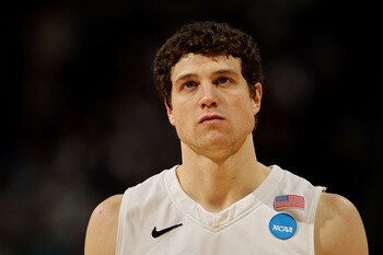 DENVER, CO - MARCH 19:  Jimmer Fredette #32 of the Brigham Young Cougars looks on against the Gonzaga Bulldogs during the third round of the 2011 NCAA men's basketball tournament at Pepsi Center on March 19, 2011 in Denver, Colorado.  (Photo by Doug Pensi