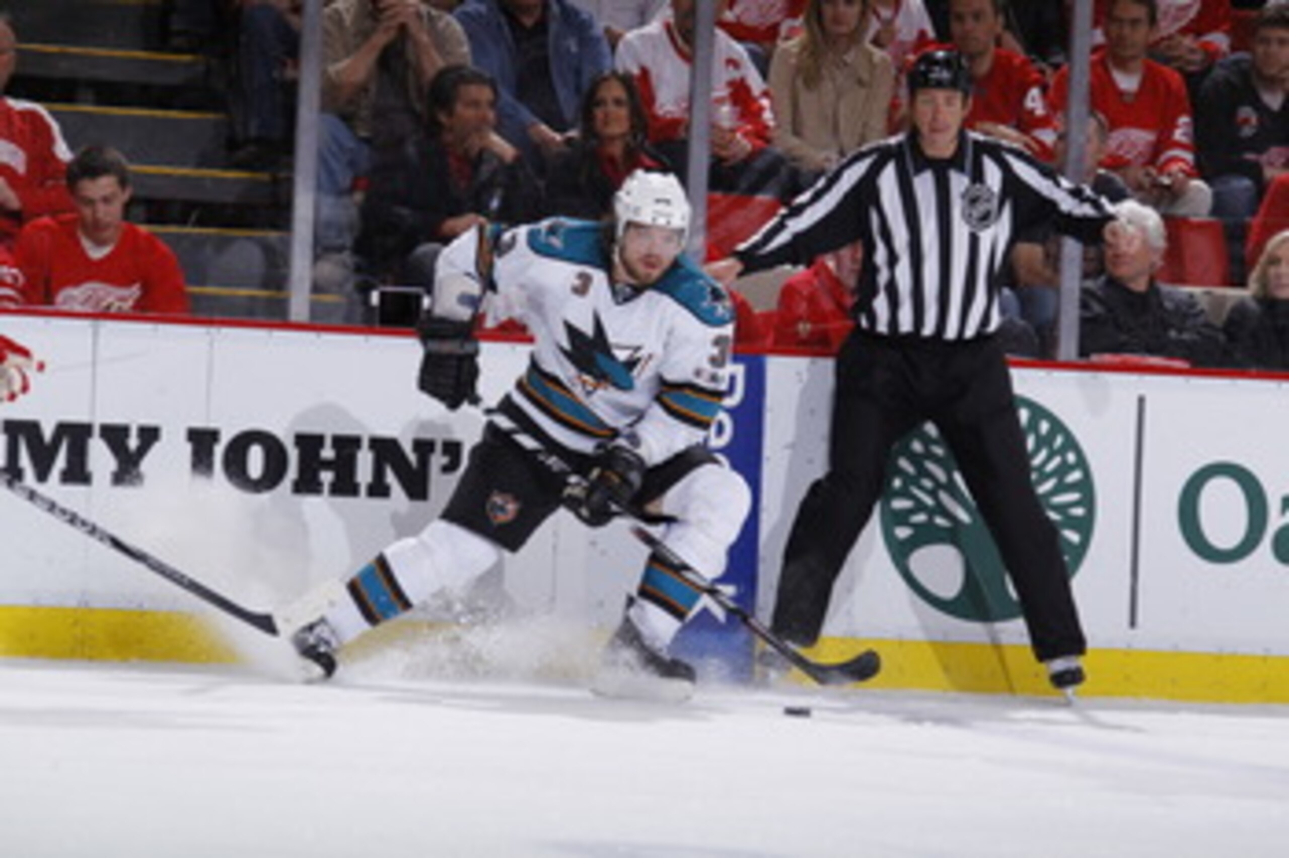 DETROIT - MAY 6: Douglas Murray #3 of the San Jose Sharks skates with the puck while playing the Detroit Red Wings in Game Four of the Western Conference Semifinals during the 2011 NHL Stanley Cup Playoffs on May 6, 2011 at Joe Louis Arena in Detroit, Mic DETROIT - MAY 6: Douglas Murray #3 of the San Jose Sharks skates with the puck while playing the Detroit Red Wings in Game Four of the Western Conference Semifinals during the 2011 NHL Stanley Cup Playoffs on May 6, 2011 at Joe Louis Arena in Detroit, Mic