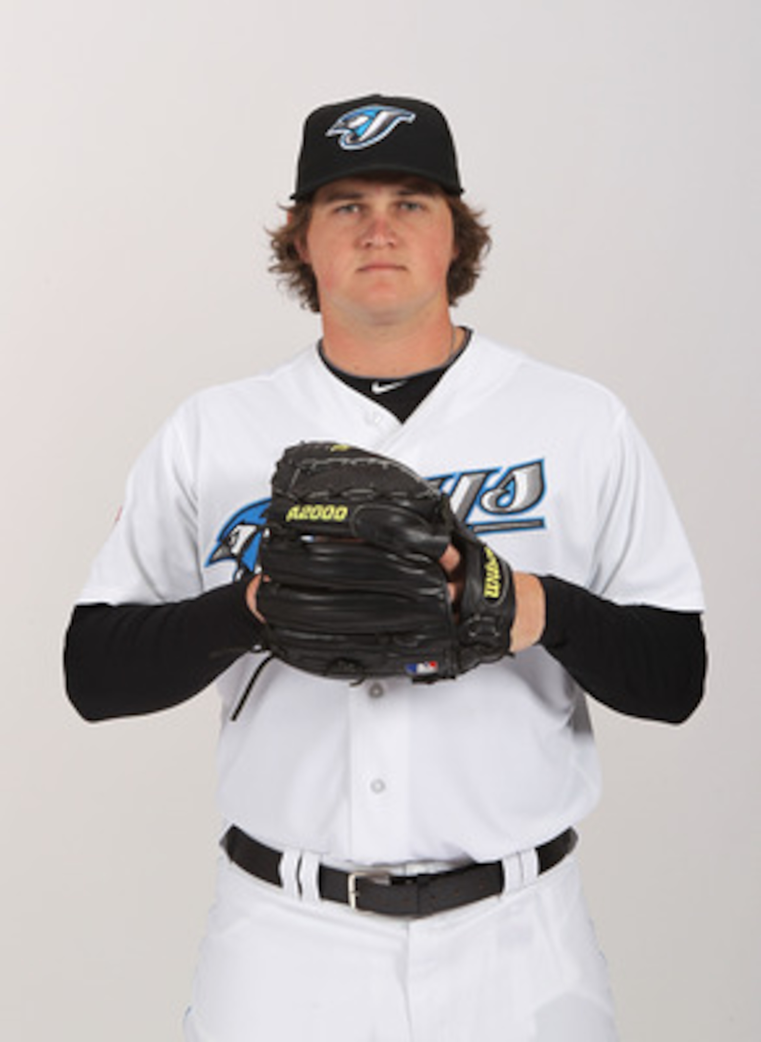 DUNEDIN, FL - FEBRUARY 20:  Chad Jenkins #64 of the Toronto Blue Jays poses during photo day at Florida Auto Exchange Stadium on February 20, 2011 in Dunedin, Florida.  (Photo by Nick Laham/Getty Images)