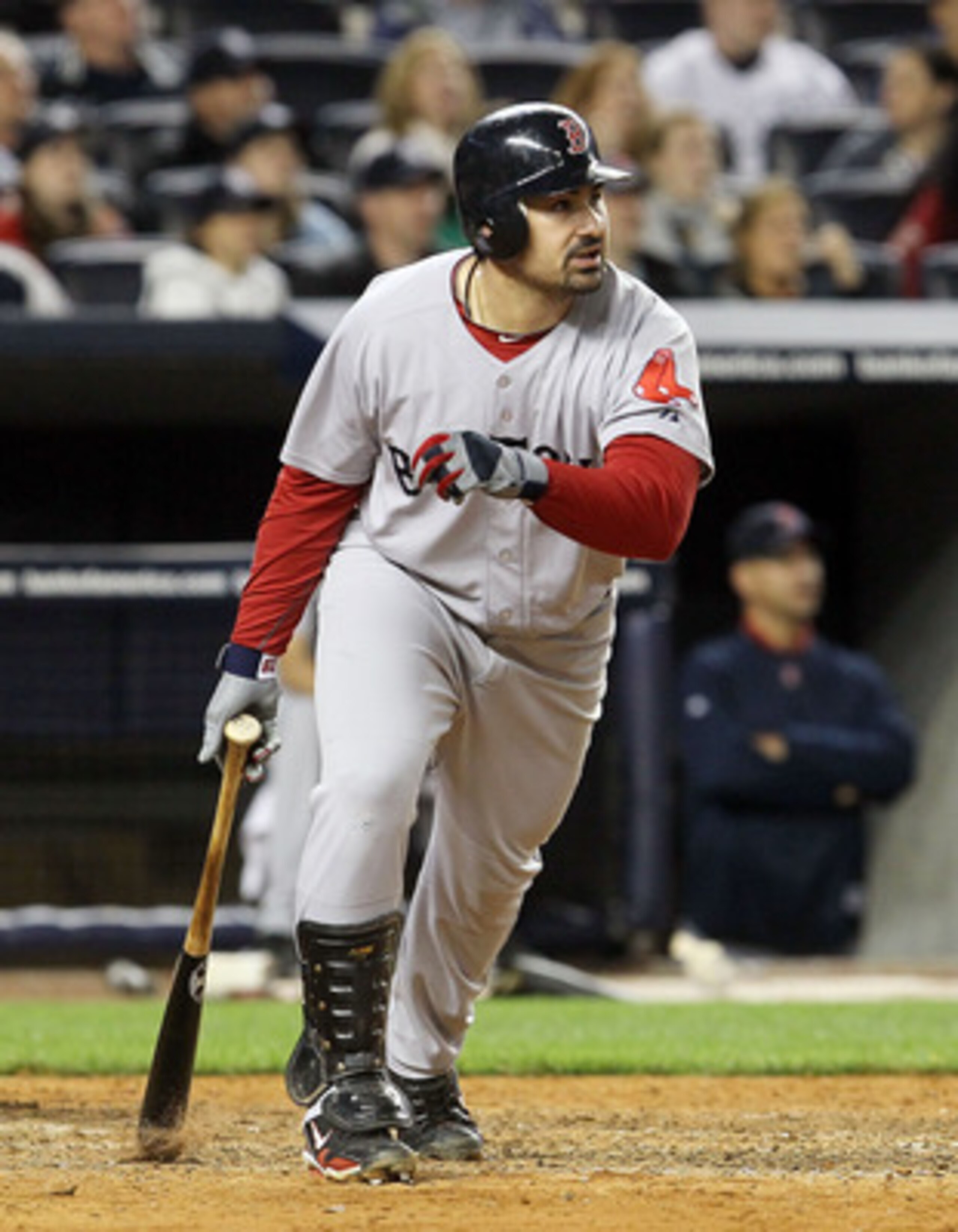 NEW YORK, NY - MAY 14:  Adrian Gonzalez #28 of the Boston Red Sox follows through on a seventh inning three run home run against the New York Yankees on May 14, 2011 at Yankee Stadium in the Bronx borough of New York City.  (Photo by Jim McIsaac/Getty Ima