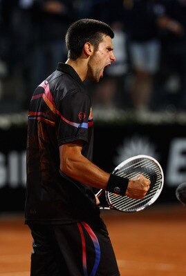 ROME, ITALY - MAY 14:  Novak Djokovic of Serbia celebrates a point during the tie break in his semi final match against Andy Murray of Great Britain during day seven of the Internazoinali BNL D'Italia at the Foro Italico Tennis Centre  on May 14, 2011 in 