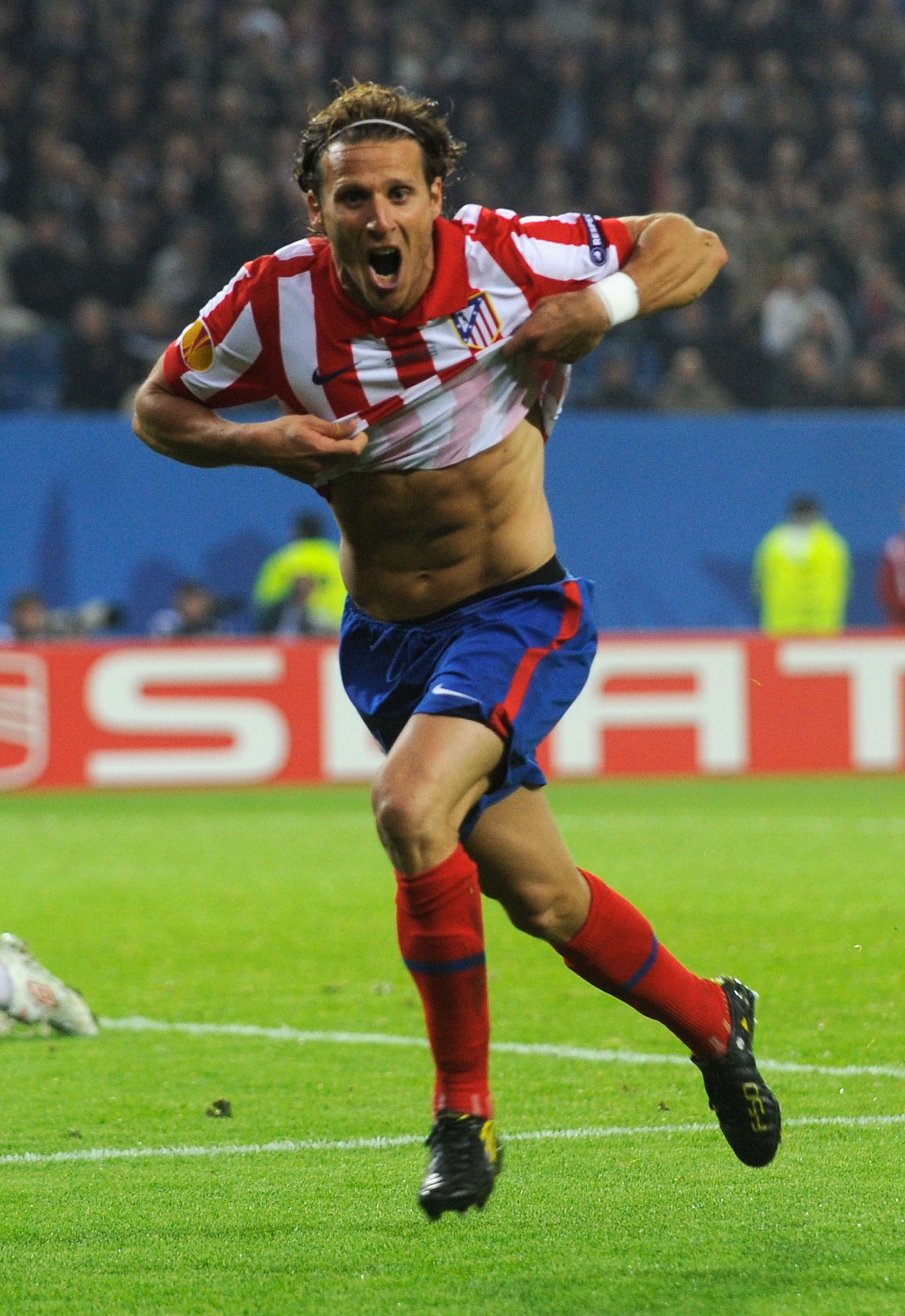 HAMBURG, GERMANY - MAY 12:  Diego Forlan of Atletico Madrid celebrates after scoring his team's second and winning goal in extra time during the UEFA Europa League final match between Atletico Madrid and Fulham at HSH Nordbank Arena on May 12, 2010 in Ham