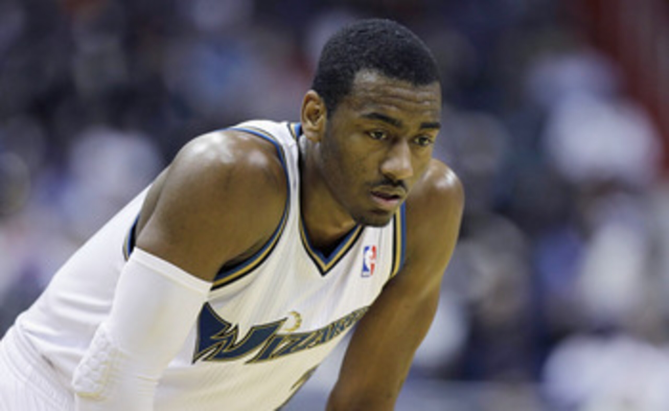 WASHINGTON, DC - MARCH 14: John Wall #2 of the Washington Wizards looks on against the Oklahoma City Thunderduring the second half at the Verizon Center on March 14, 2011 in Washington, DC. NOTE TO USER: User expressly acknowledges and agrees that, by dow