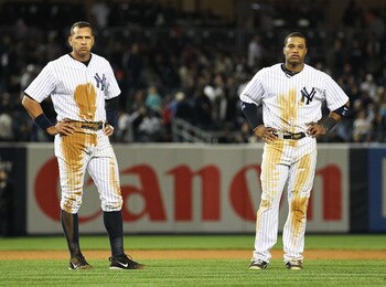 NEW YORK, NY - MAY 13:  Alex Rodriguez #13 and Robinson Cano #24 of the New York Yankees are left on base at the end of the the eigth inning against the Boston Red Sox on May 13, 2011 at Yankee Stadium in the Bronx borough of New York City.  (Photo by Al