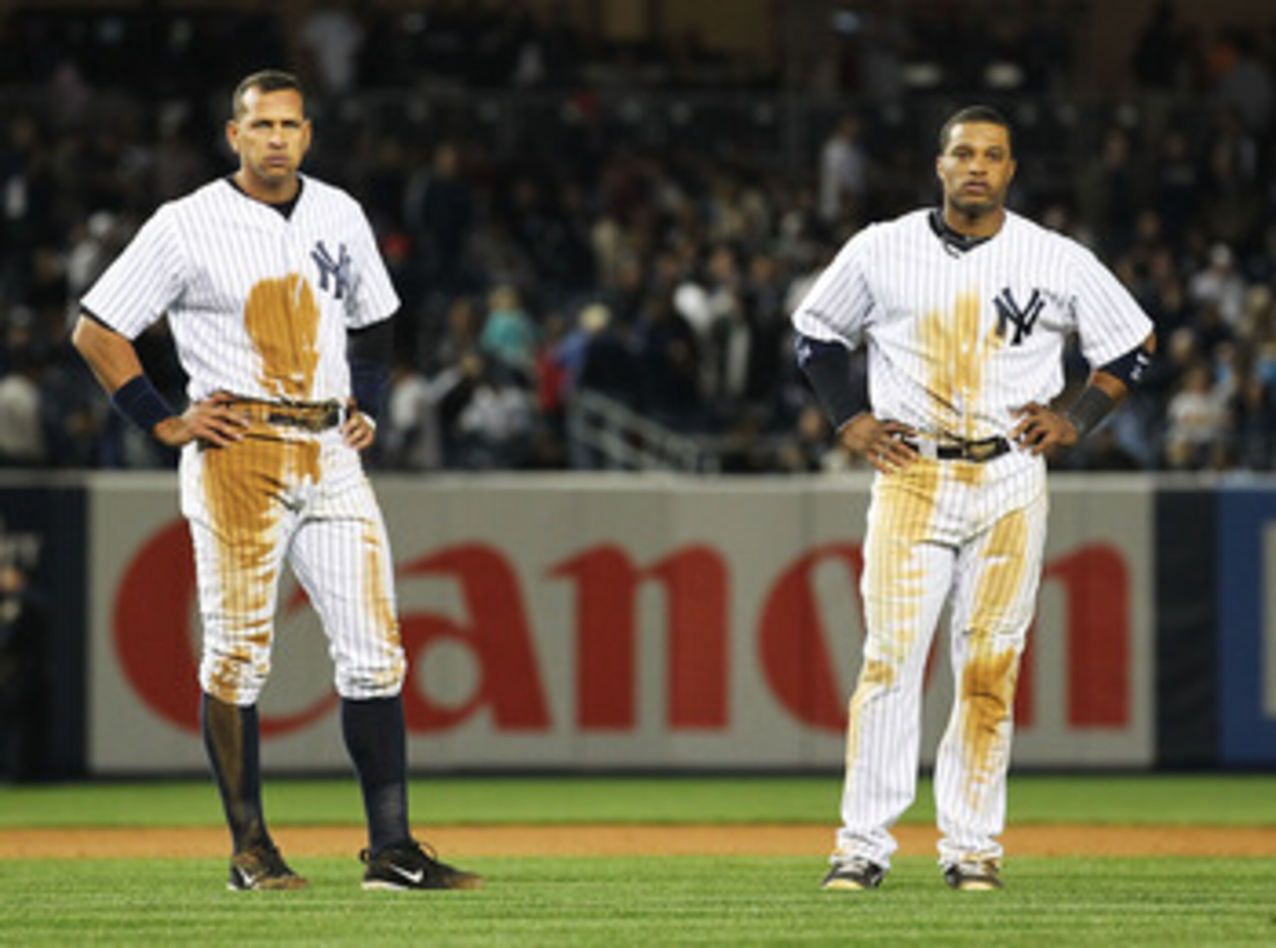 NEW YORK, NY - MAY 13:  Alex Rodriguez #13 and Robinson Cano #24 of the New York Yankees are left on base at the end of the the eigth inning against the Boston Red Sox on May 13, 2011 at Yankee Stadium in the Bronx borough of New York City.  (Photo by Al