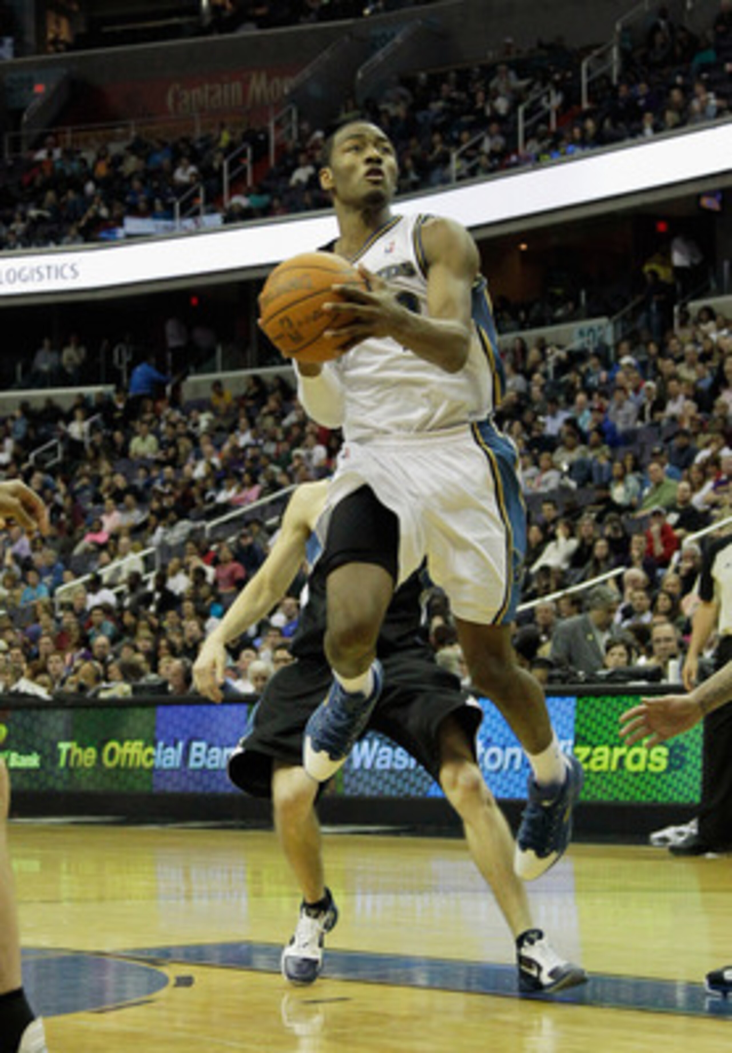 WASHINGTON, DC - MARCH 05:  John Wall #2 of the Washington Wizards puts up a shot against the Minnesota Timberwolves at the Verizon Center on March 5, 2011 in Washington, DC. NOTE TO USER: User expressly acknowledges and agrees that, by downloading and/or
