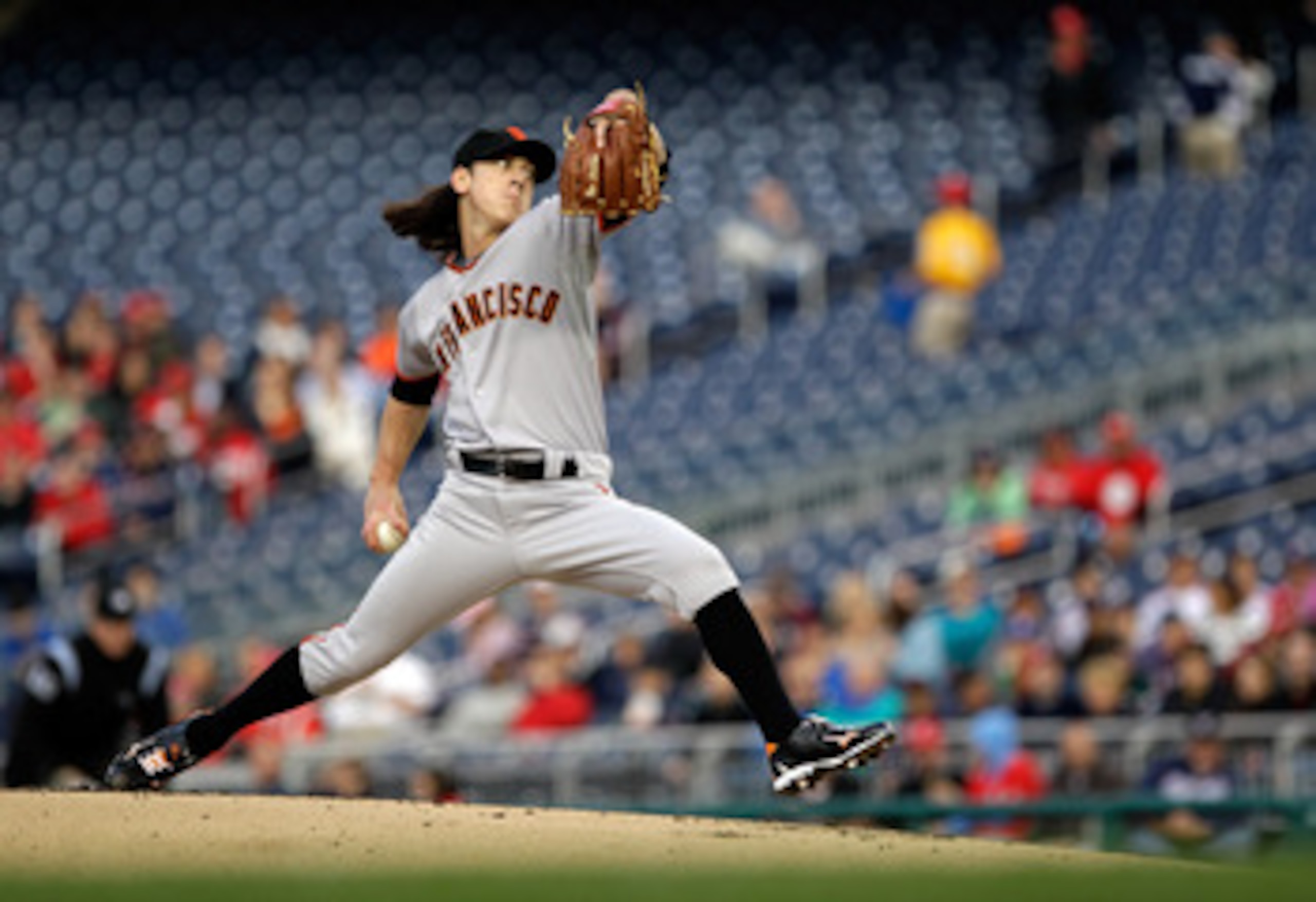 WASHINGTON, DC - APRIL 29:  Starting pitcher Tim Lincecum #55 of the San Francisco Giants delivers to a Washington Nationals batter at Nationals Park on April 29, 2011 in Washington, DC.  (Photo by Rob Carr/Getty Images)