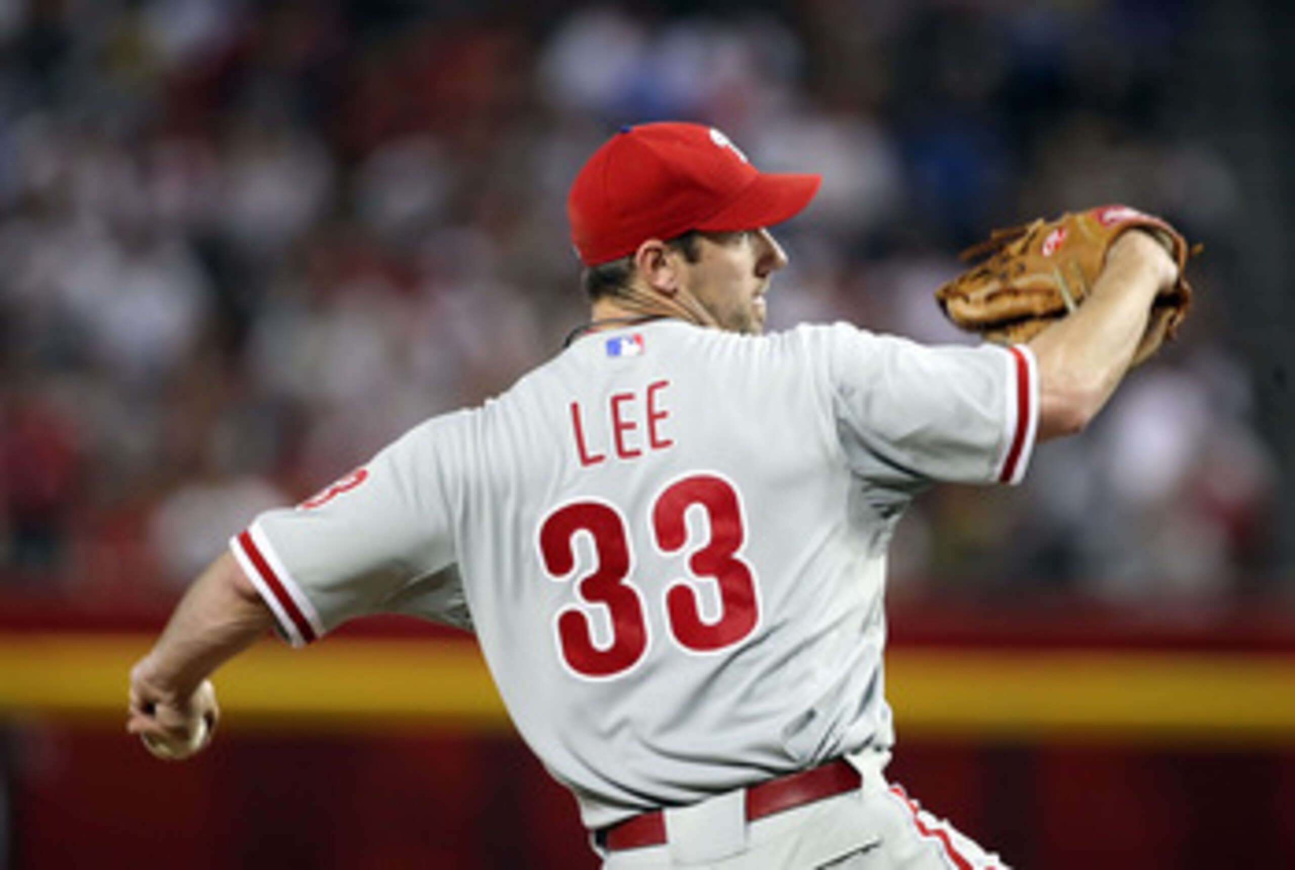 PHOENIX, AZ - APRIL 25:  Starting pitcher Cliff Lee #33 of the Philadelphia Phillies pitches against the Arizona Diamondbacks during the Major League Baseball game at Chase Field on April 25, 2011 in Phoenix, Arizona.  The Diamondbacks defeated the Philli