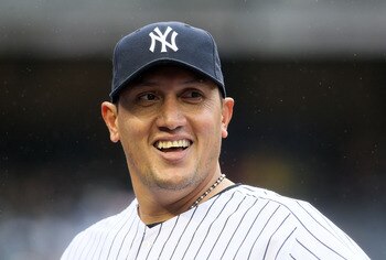 NEW YORK, NY - APRIL 16:  Freddy Garcia #36 of the New York Yankees looks on against the Texas Rangers on April 16, 2011 at Yankee Stadium in the Bronx borough of New York City.  (Photo by Jim McIsaac/Getty Images)