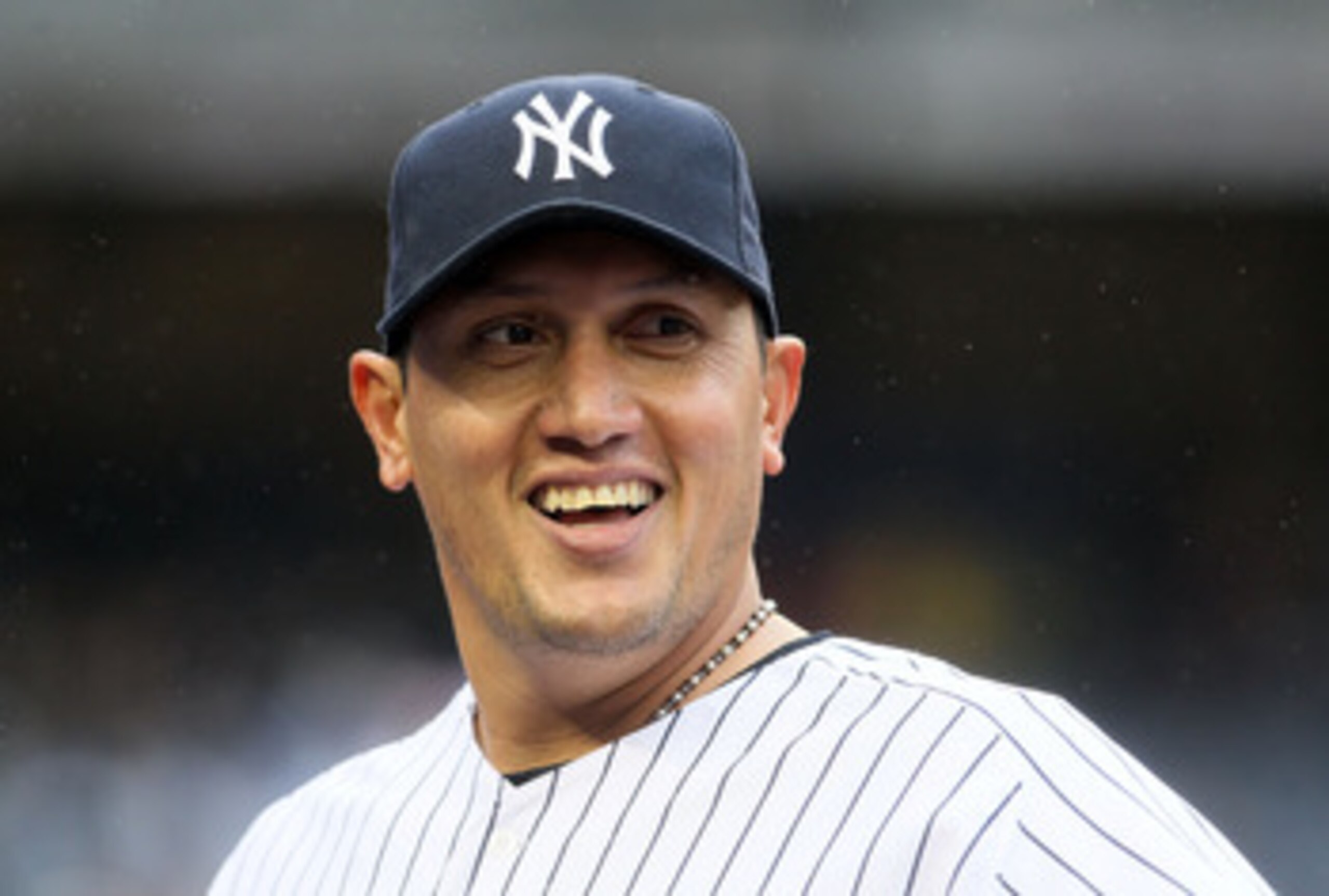 NEW YORK, NY - APRIL 16:  Freddy Garcia #36 of the New York Yankees looks on against the Texas Rangers on April 16, 2011 at Yankee Stadium in the Bronx borough of New York City.  (Photo by Jim McIsaac/Getty Images)