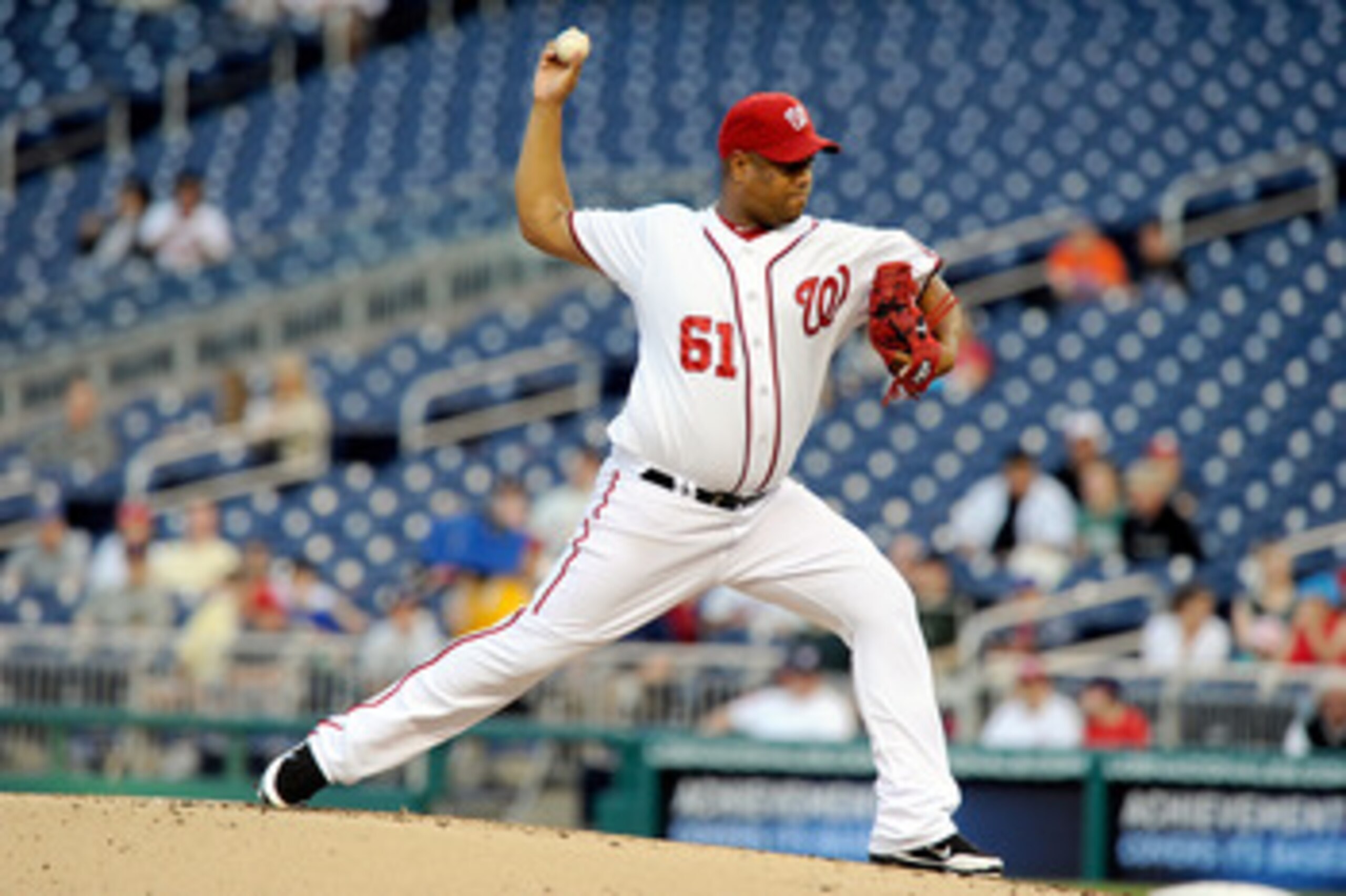 WASHINGTON, DC - APRIL 28:  Livan Hernandez #61 of the Washington Nationals pitches against the New York Mets at Nationals Park on April 28, 2011 in Washington, DC.  (Photo by Greg Fiume/Getty Images)