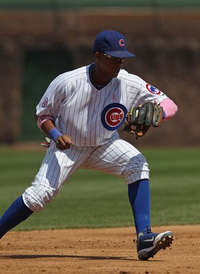 CHICAGO, IL - MAY 08:  tarlin Castro #13 of the Chicago Cubs fields the ball against the Cincinnati Reds at Wrigley Field on May 8, 2011 in Chicago, Illinois. The Reds defeated the Cubs 2-0. (Photo by Jonathan Daniel/Getty Images)