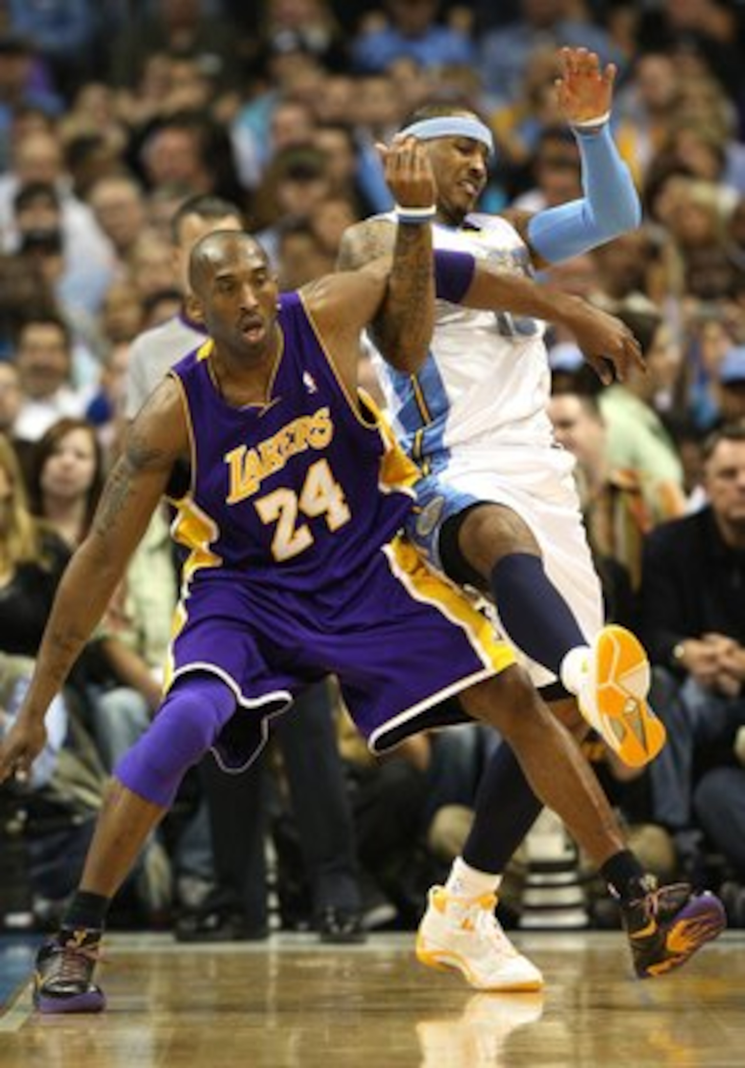 DENVER - MAY 25:  Kobe Bryant #24 of the Los Angeles Lakers defends against Carmelo Anthony #15 of the Denver Nuggets in Game Four of the Western Conference Finals during the 2009 NBA Playoffs at Pepsi Center on May 25, 2009 in Denver, Colorado. NOTE TO U
