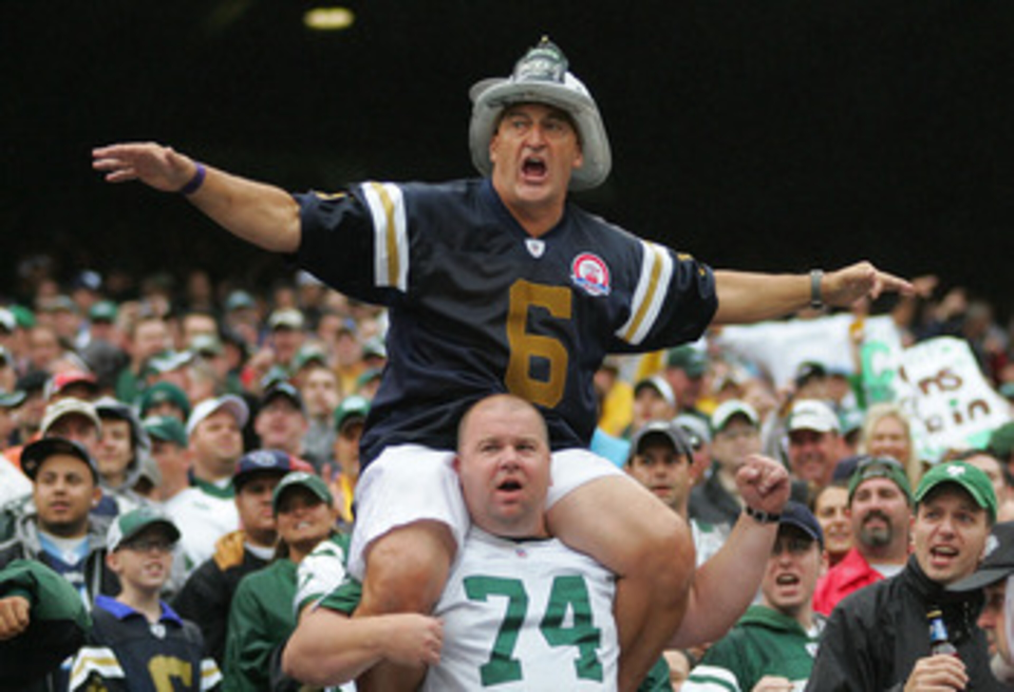 EAST RUTHERFORD, NJ - SEPTEMBER 27: Ed Anzalone orchestrates a chant during the New York Jets game against the Tennessee Titans on September 27, 2009 at Giants Stadium in East Rutherford, New Jersey. (Photo by Jared Wickerham/Getty Images)