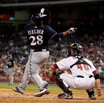 HOUSTON - APRIL 30:  Prince Fielder #28 of the Milwaukee Brewers and catcher J.R. Towels #46 of the Houston Astros watch the ball leave the park in the ninth inning as he hits a home run to right field to tie the game against the Houston Astros at Minute 