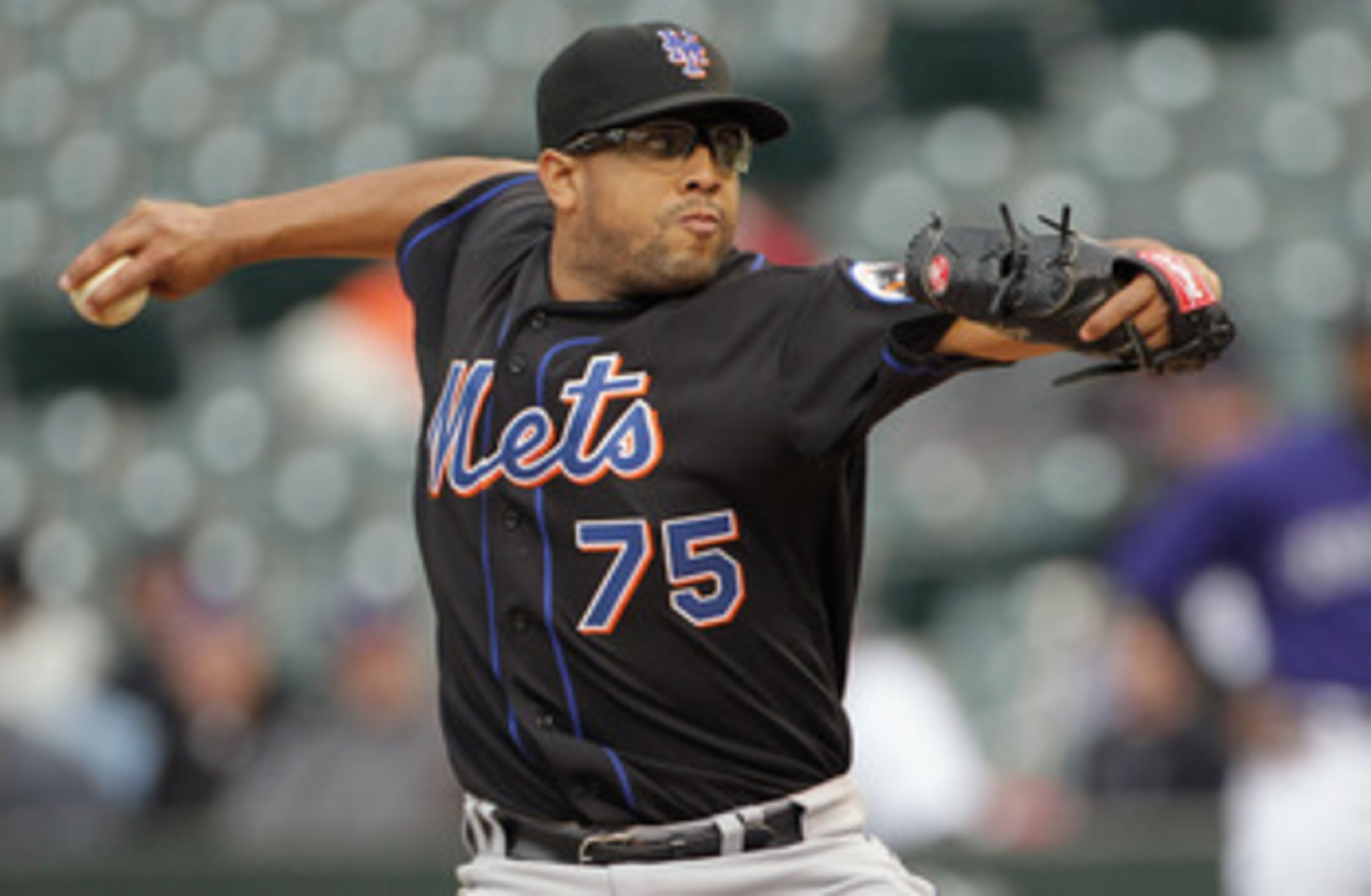 DENVER, CO - MAY 12:  Pitcher Francisco Rodriguez #75 of the New York Mets works against the Colorado Rockies in the ninth inning at Coors Field on May 12, 2011 in Denver, Colorado. The Mets defeated the Rockies 9-5.  (Photo by Doug Pensinger/Getty Images