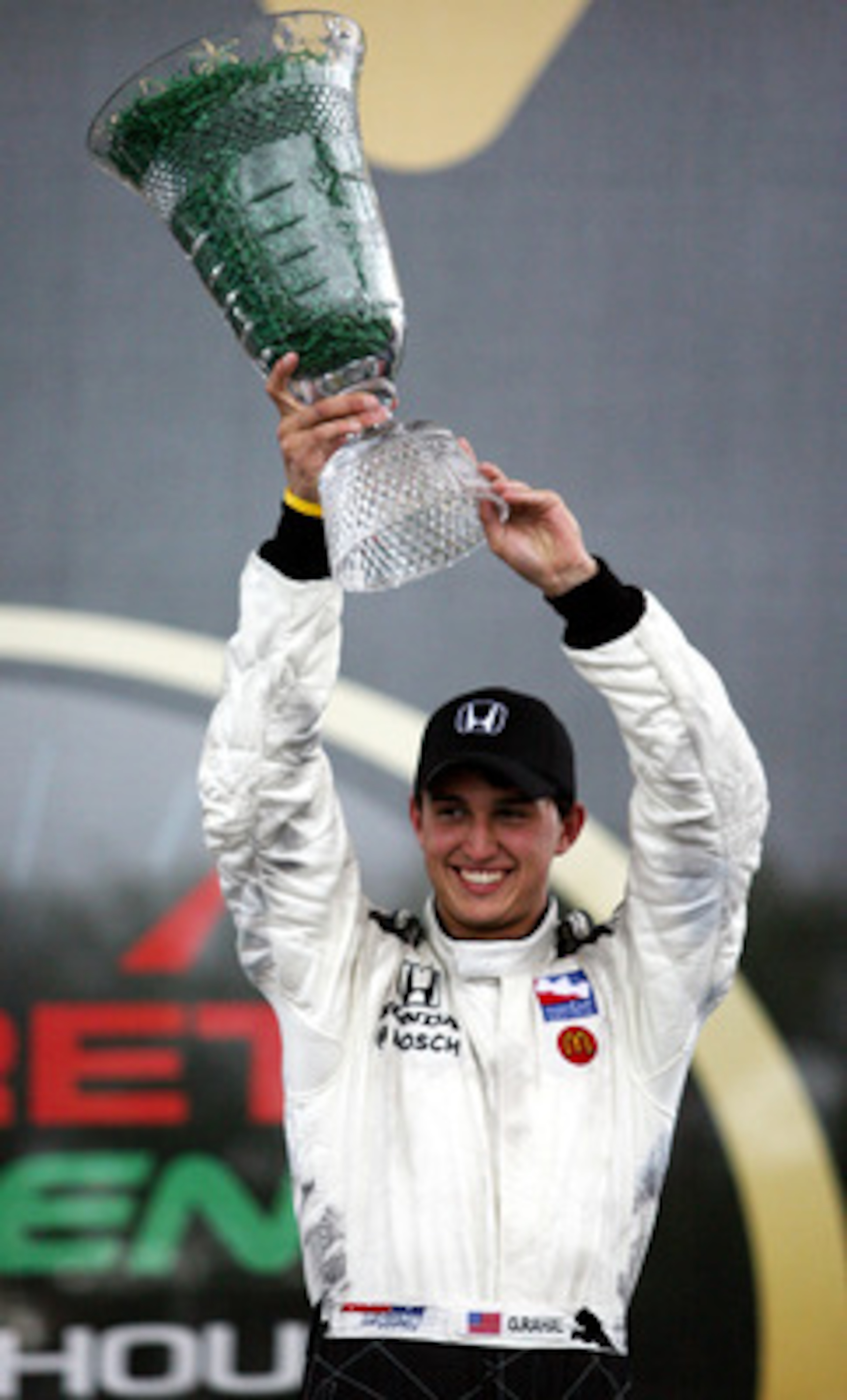 ST.PETERSBURG, FL - APRIL 06: Graham Rahal in the #06 Hole in the Wall Camps Newman/Haas/Lanigan Racing car holds up the winning trophy after the IRL IndyCar Series Honda Grand Prix of St. Petersburg on April 6, 2008 on the streets of St. Petersburg, Flor