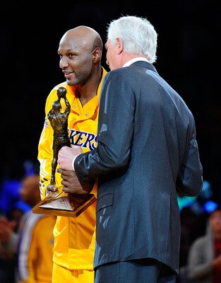 LOS ANGELES, CA - APRIL 20:  Lamar Odom #7 of the Los Angeles Lakers receives the Kia Six Man of the Year Award from Lakers General Manager Mitch Kupchak before Game Two of the Western Conference Quarterfinals in the 2011 NBA Playoffs against the New Orle