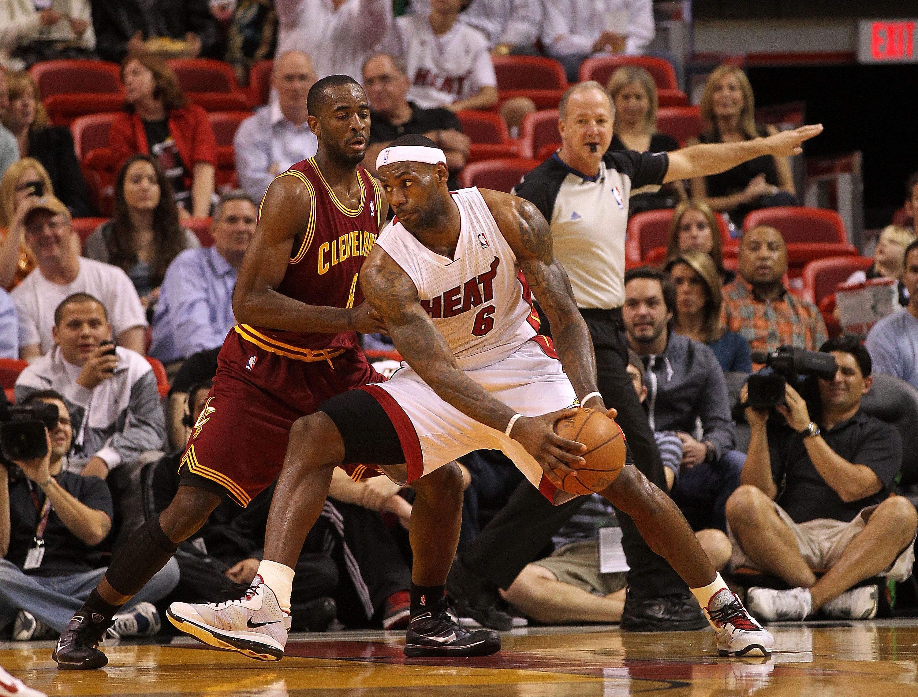 MIAMI, FL - JANUARY 31:  LeBron James #6 of the Miami Heat posts up Daniel Gibson #1 of the Cleveland Cavaliers during a game at American Airlines Arena on January 31, 2011 in Miami, Florida. NOTE TO USER: User expressly acknowledges and agrees that, by d