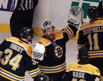 BOSTON, MA - MAY 06:  Tim Thomas #30 of the Boston Bruins celebrates victory over the Philadelphia Flyers in Game Four of the Eastern Conference Semifinals during the 2011 NHL Stanley Cup Playoffs at TD Garden on May 6, 2011 in Boston, Massachusetts. The