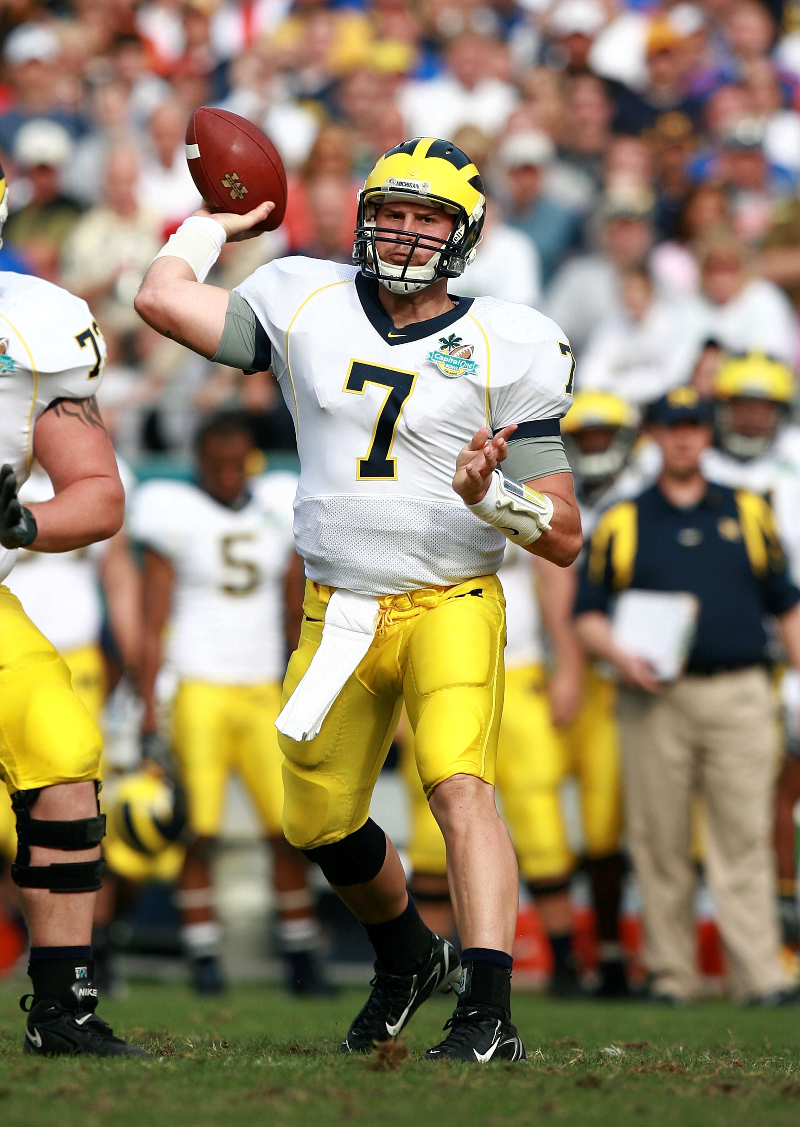ORLANDO, FL - JANUARY 01:  Quarterback Chad Henne #7 of the Michigan Wolverines throws a pass against the Florida Gators in the Capital One Bowl at Florida Citrus Bowl on January 1, 2008 in Orlando, Florida.  (Photo by Doug Benc/Getty Images)