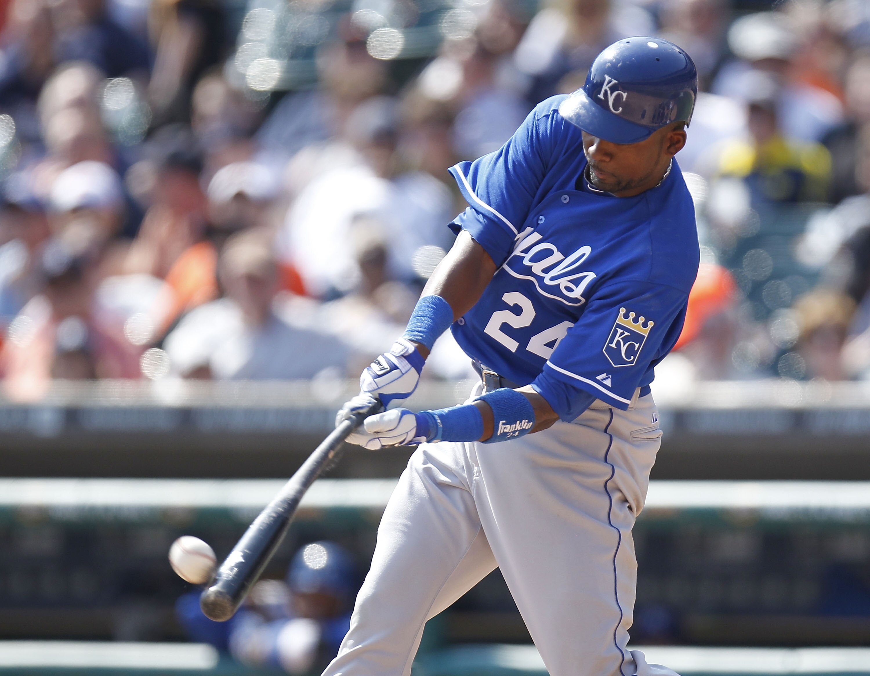 DETROIT, MI - APRIL 10:  Wilson Betemit #24 of the Kansas City Royals hits a seventh inning RBI double while playing the Detroit Tigers at Comerica Park on April 10, 2011 in Detroit, Michigan.  (Photo by Gregory Shamus/Getty Images)