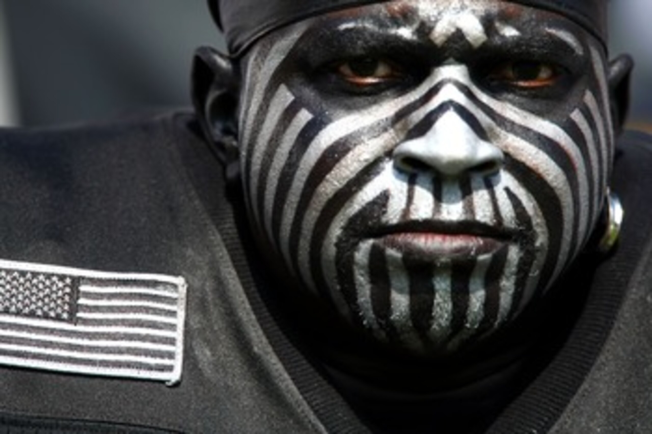 SAN DIEGO - OCTOBER 14:  An Oakland Raider fan looks on during the first half of the game against the San Diego Chargers on October 14, 2007 at Qualcomm Stadium in San Diego, California.  (Photo by Donald Miralle/Getty Images)