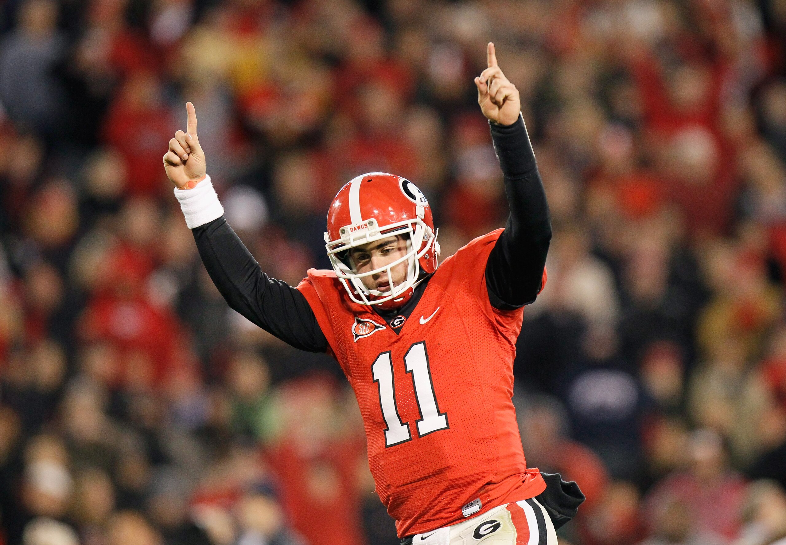 ATHENS, GA - NOVEMBER 27: Quarterback Aaron Murray #11 of the Georgia Bulldogs reacts after scoring a touchdown against the Georgia Tech Yellow Jackets at Sanford Stadium on November 27, 2010 in Athens, Georgia. (Photo by Kevin C. Cox/Getty Images) ATHENS, GA - NOVEMBER 27: Quarterback Aaron Murray #11 of the Georgia Bulldogs reacts after scoring a touchdown against the Georgia Tech Yellow Jackets at Sanford Stadium on November 27, 2010 in Athens, Georgia. (Photo by Kevin C. Cox/Getty Images)
