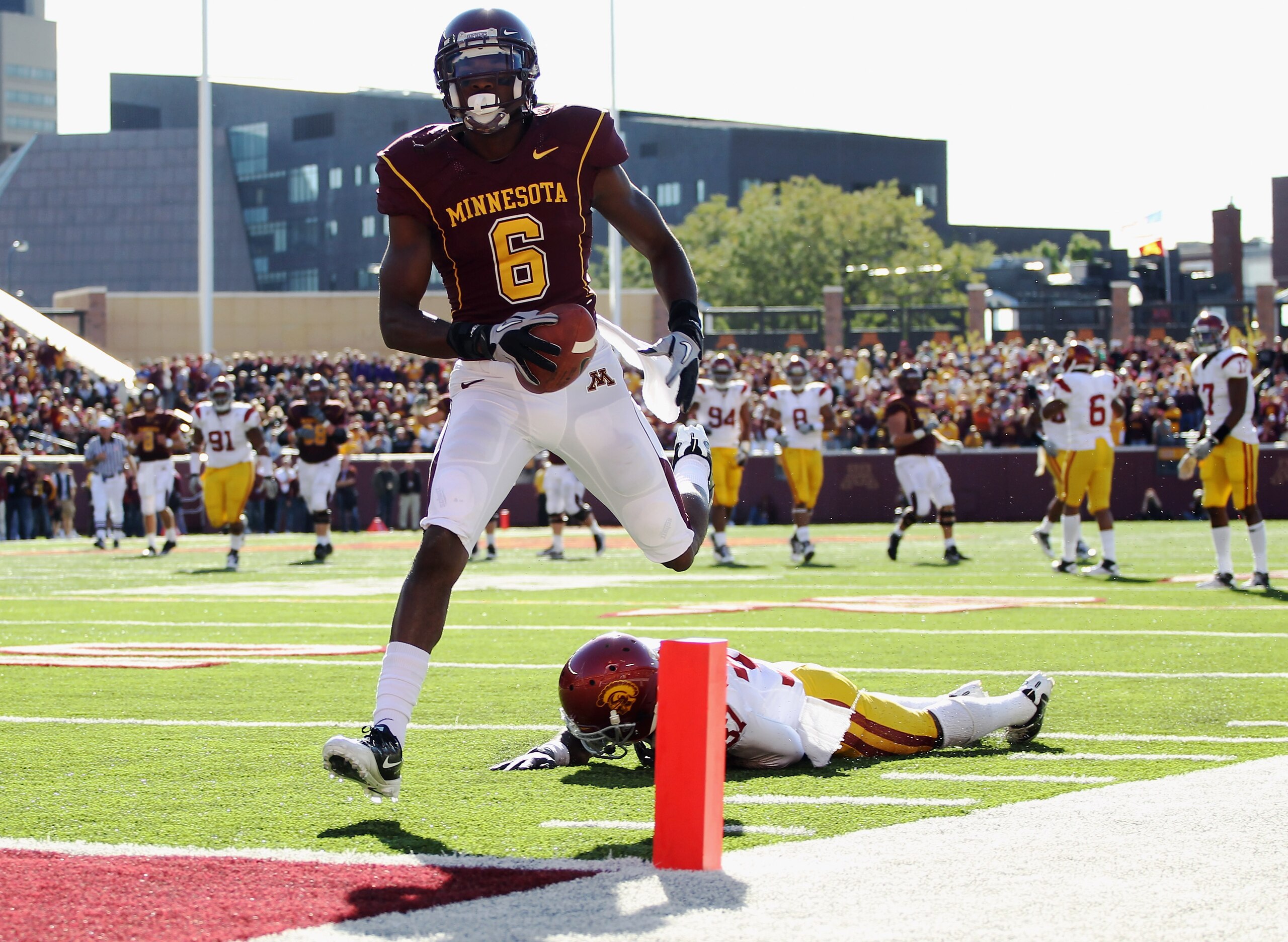 MINNEAPOLIS - SEPTEMBER 18: Da'Jon McKnight #6 of the Minnesota Golden Gophers carries the ball into the endzone for a touchdown after catching a pass during the game against the USC Trojans on September 18, 2010 at TCF Bank Stadium in Minneapolis, Minne MINNEAPOLIS - SEPTEMBER 18: Da'Jon McKnight #6 of the Minnesota Golden Gophers carries the ball into the endzone for a touchdown after catching a pass during the game against the USC Trojans on September 18, 2010 at TCF Bank Stadium in Minneapolis, Minne