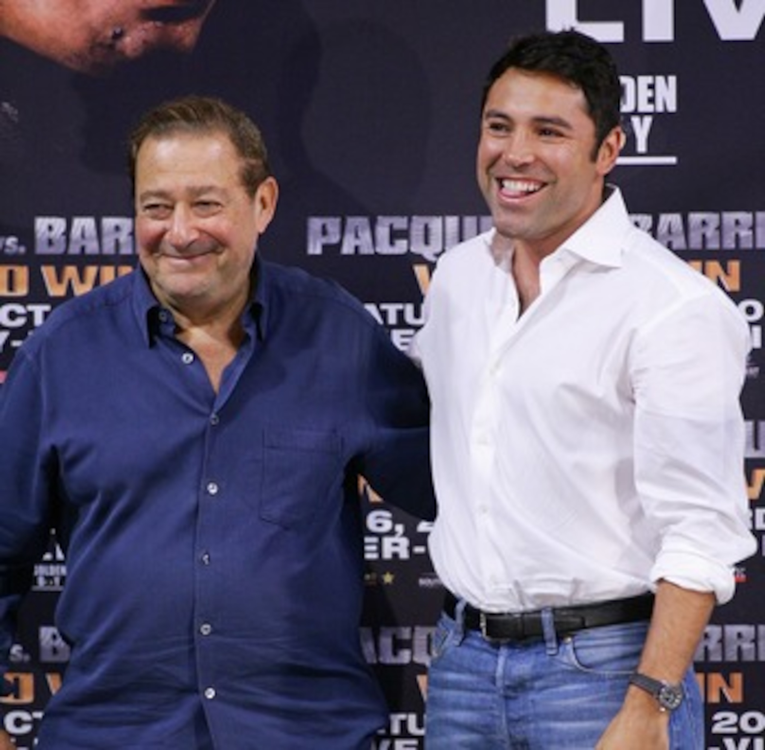 LAS VEGAS - OCTOBER 05:  Boxing promoter Bob Arum (L) and boxer and president of Golden Boy Promotions Oscar De La Hoya greet each other at the official weigh-in for boxers Manny Pacquiao and Marco Antonio Barrera at the Mandalay Bay Events Center October