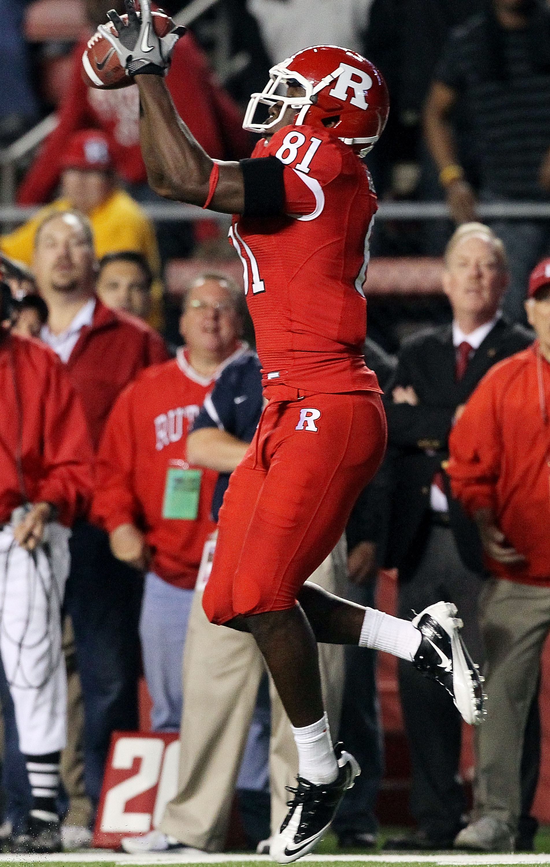 PISCATAWAY, NJ - OCTOBER 08:  Mark Harrison #81 of the Rutgers Scarlet Knights hauls in the game-tying touchdown pass against the Connecticut Huskies at Rutgers Stadium on October 8, 2010 in Piscataway, New Jersey. Rutgers defeated UConn 27-24.  (Photo by