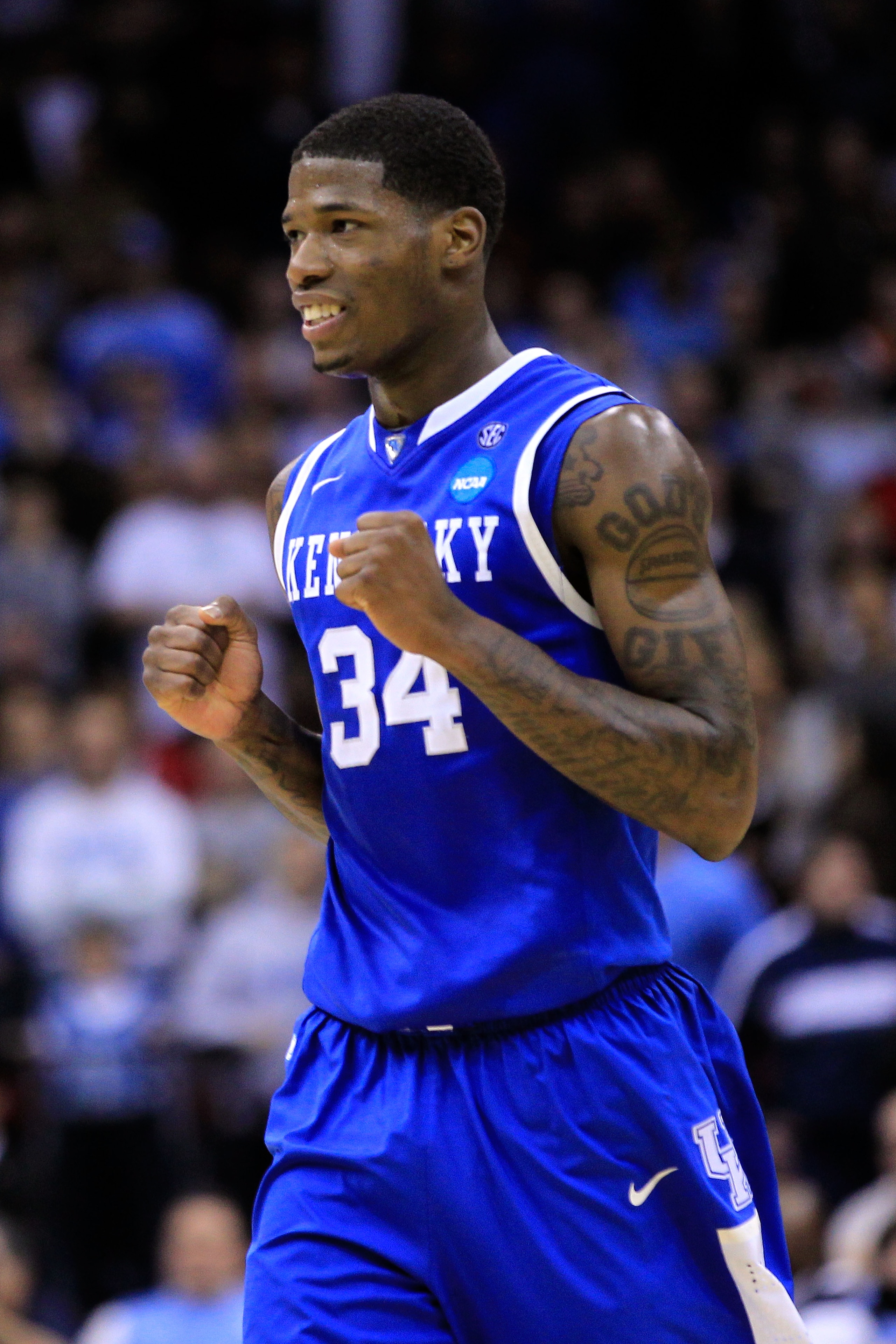 NEWARK, NJ - MARCH 27: DeAndre Liggins #34 of the Kentucky Wildcats reacts after a point against the North Carolina Tar Heels in the east regional final of the 2011 NCAA men's basketball tournament at Prudential Center on March 27, 2011 in Newark, New Je NEWARK, NJ - MARCH 27: DeAndre Liggins #34 of the Kentucky Wildcats reacts after a point against the North Carolina Tar Heels in the east regional final of the 2011 NCAA men's basketball tournament at Prudential Center on March 27, 2011 in Newark, New Je