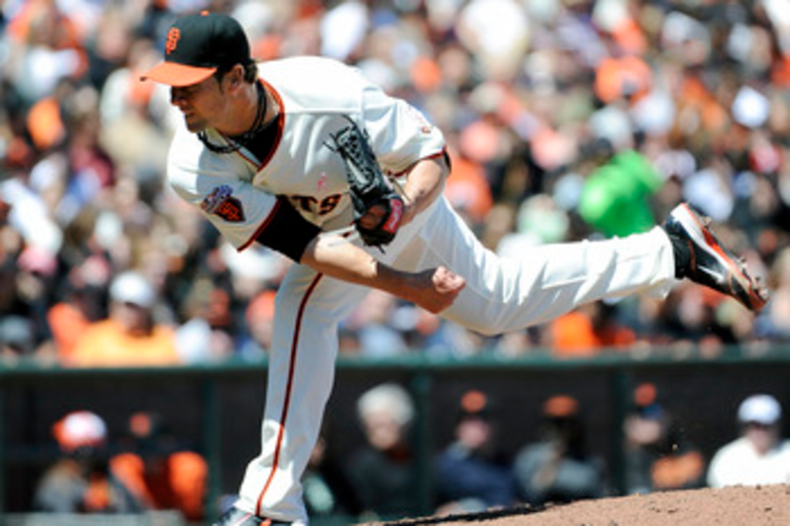 SAN FRANCISCO, CA - MAY 8: Ryan Vogelsong #32 of the San Francisco Giants pitches against Colorado Rockies during a MLB baseball game at AT&T Park May 8, 2011 in San Francisco, California.  The Giants won the game 3-1. (Photo by Thearon W. Henderson/Getty