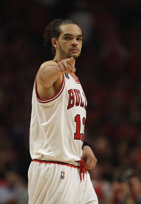 CHICAGO, IL - MAY 10: Joakim Noah #13 of the Chicago Bulls points to family in the stands before taking on Atlanta Hawks in Game Five of the Eastern Conference Semifinals in the 2011 NBA Playoffs at the United Center on May 10, 2011 in Chicago, Illinois. 