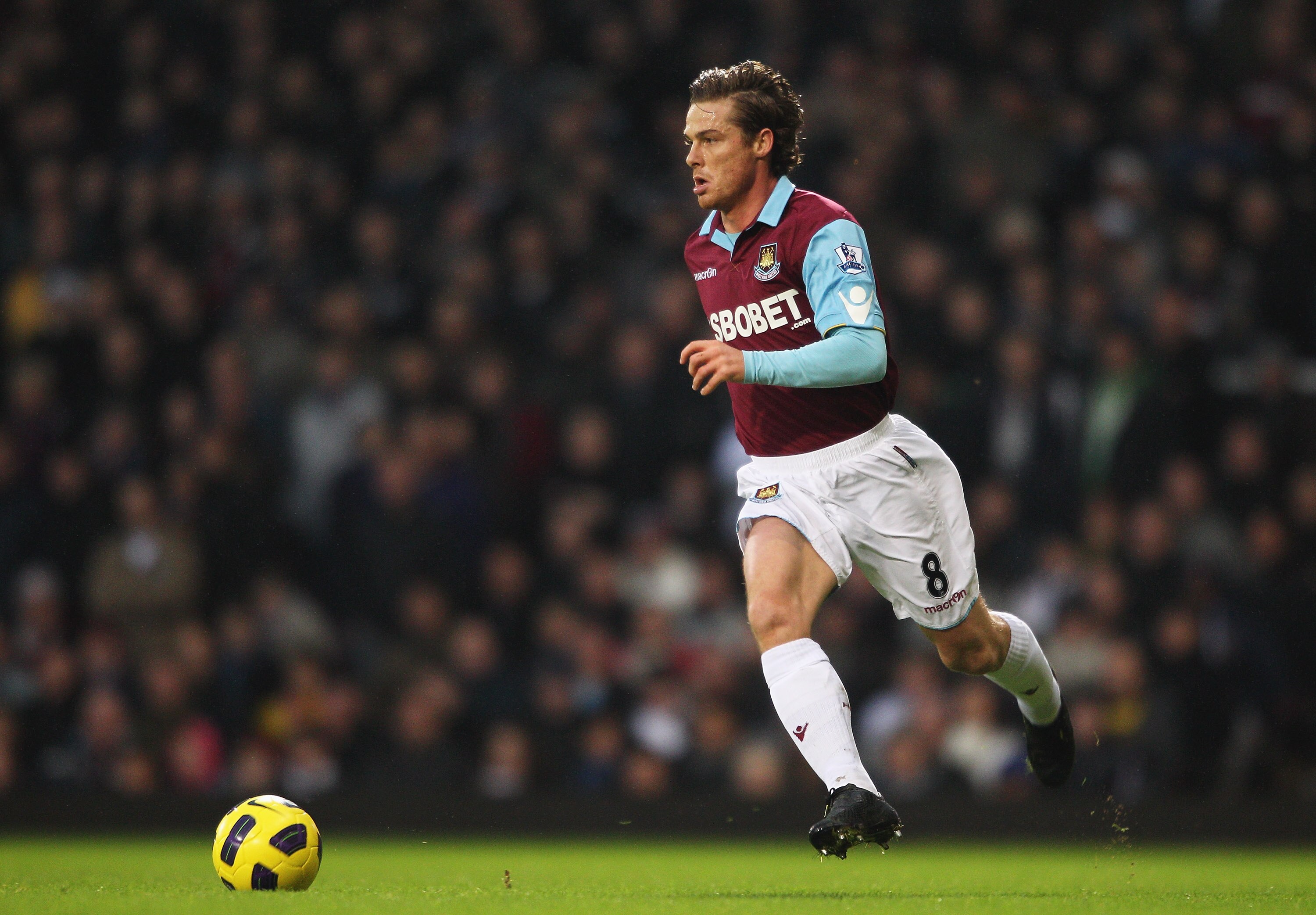 LONDON, ENGLAND - JANUARY 01: Scott Parker of West Ham United in action during the Barclays Premier League match between West Ham United and Wolverhampton Wanderers at the Boleyn Ground on January 1, 2011 in London, England.  (Photo by Dean Mouhtaropoulos