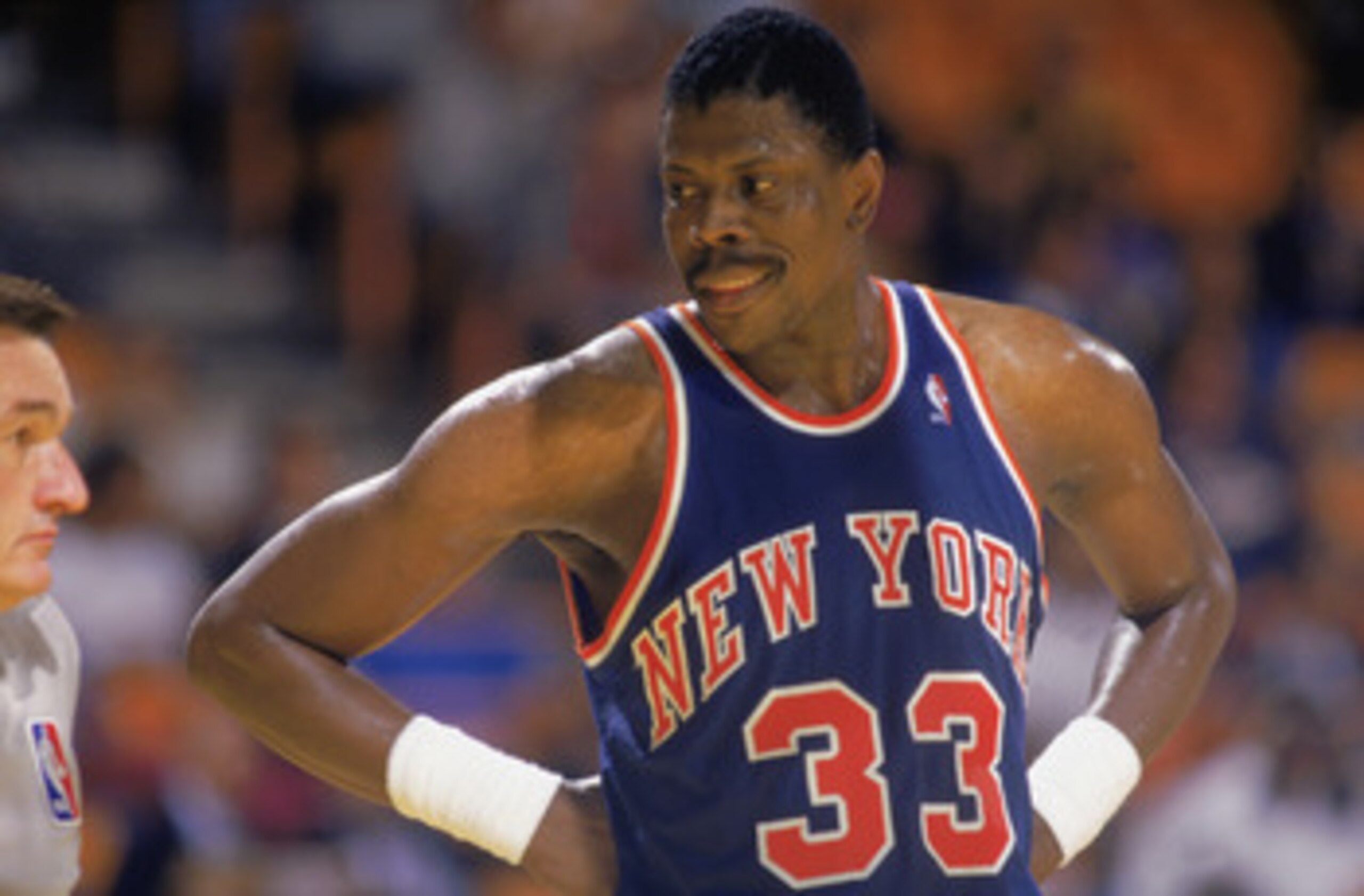 LOS ANGELES - 1987:  Patrick Ewing #33 of the New York Knicks laughs with a referee during an NBA game against the Los Angeles Lakers at the Great Western Forum in Los Angeles, California in 1987. (Photo by: Mike Powell/Getty Images)
