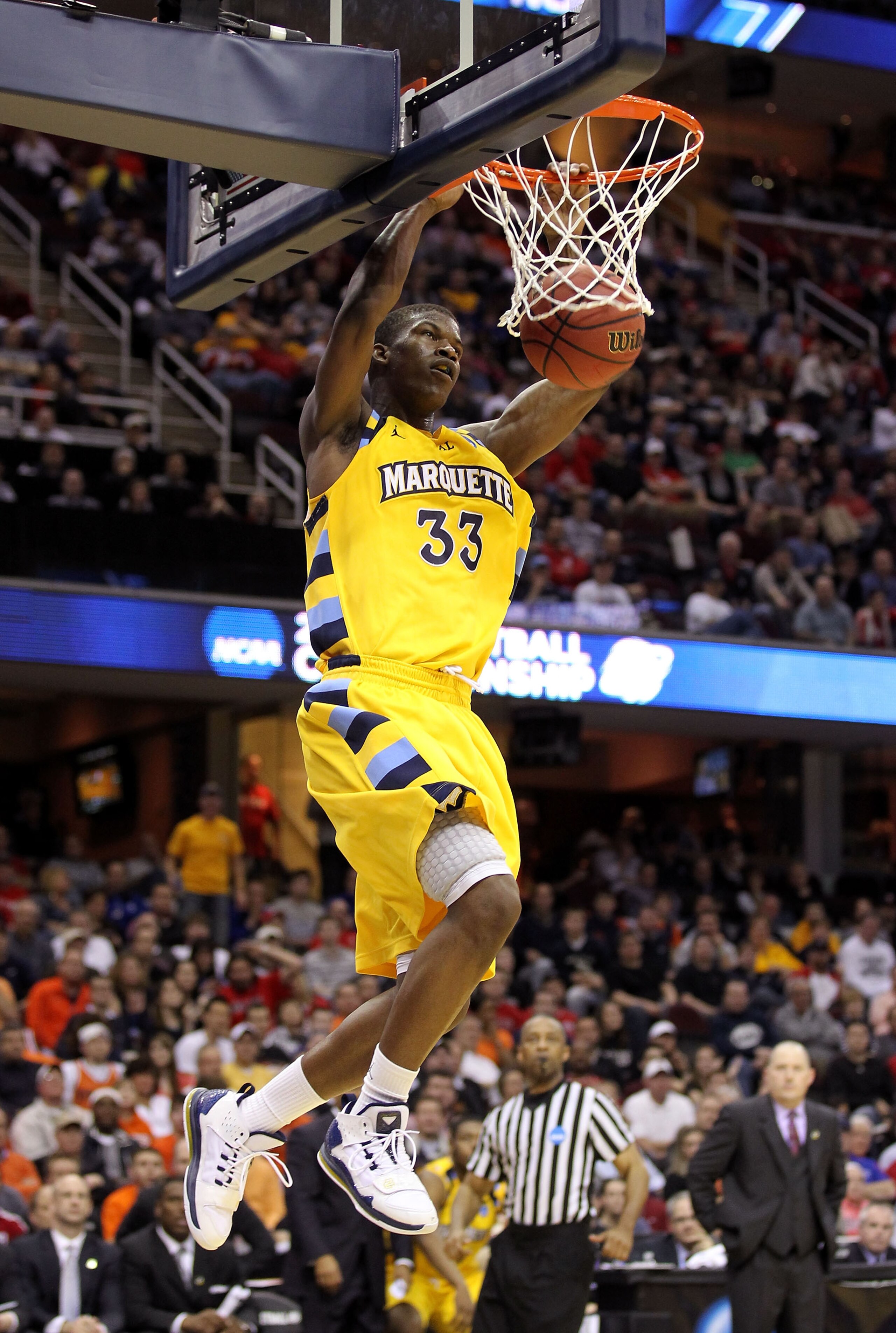 CLEVELAND, OH - MARCH 18: Jimmy Butler #33 of the Marquette Golden Eagles dunks the ball against the Xavier Musketeers during the second round of the 2011 NCAA men's basketball tournament at Quicken Loans Arena on March 18, 2011 in Cleveland, Ohio. (Phot CLEVELAND, OH - MARCH 18: Jimmy Butler #33 of the Marquette Golden Eagles dunks the ball against the Xavier Musketeers during the second round of the 2011 NCAA men's basketball tournament at Quicken Loans Arena on March 18, 2011 in Cleveland, Ohio. (Phot