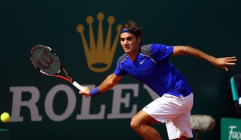MONACO - APRIL 14:  Roger Federer of Switzerland plays a forehand in his match against Marin Cilic of Croatia during Day Five of the ATP Masters Series Tennis at the Monte Carlo Country Club on April 14, 2011 in Monte Carlo, Monaco.  (Photo by Julian Finn