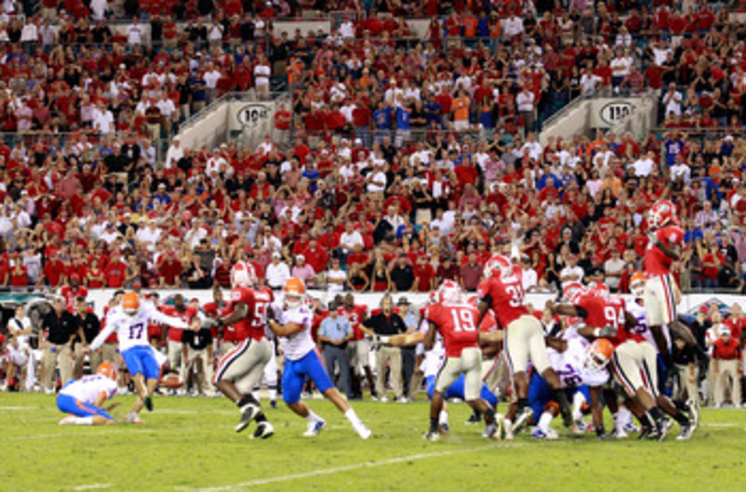 JACKSONVILLE, FL - OCTOBER 30:  Chas Henry #17 of the Florida Gators attempts a game winning field goal against the Georgia Bulldogs at EverBank Field on October 30, 2010 in Jacksonville, Florida.  (Photo by Sam Greenwood/Getty Images)