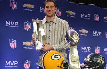 DALLAS, TX - FEBRUARY 07:  Green Bay Packers quarterback Aaron Rodgers poses with the MVP trophy after speaking to the media during a press conference at Super Bowl XLV Media Center on February 7, 2011 in Dallas, Texas.  (Photo by Streeter Lecka/Getty Ima