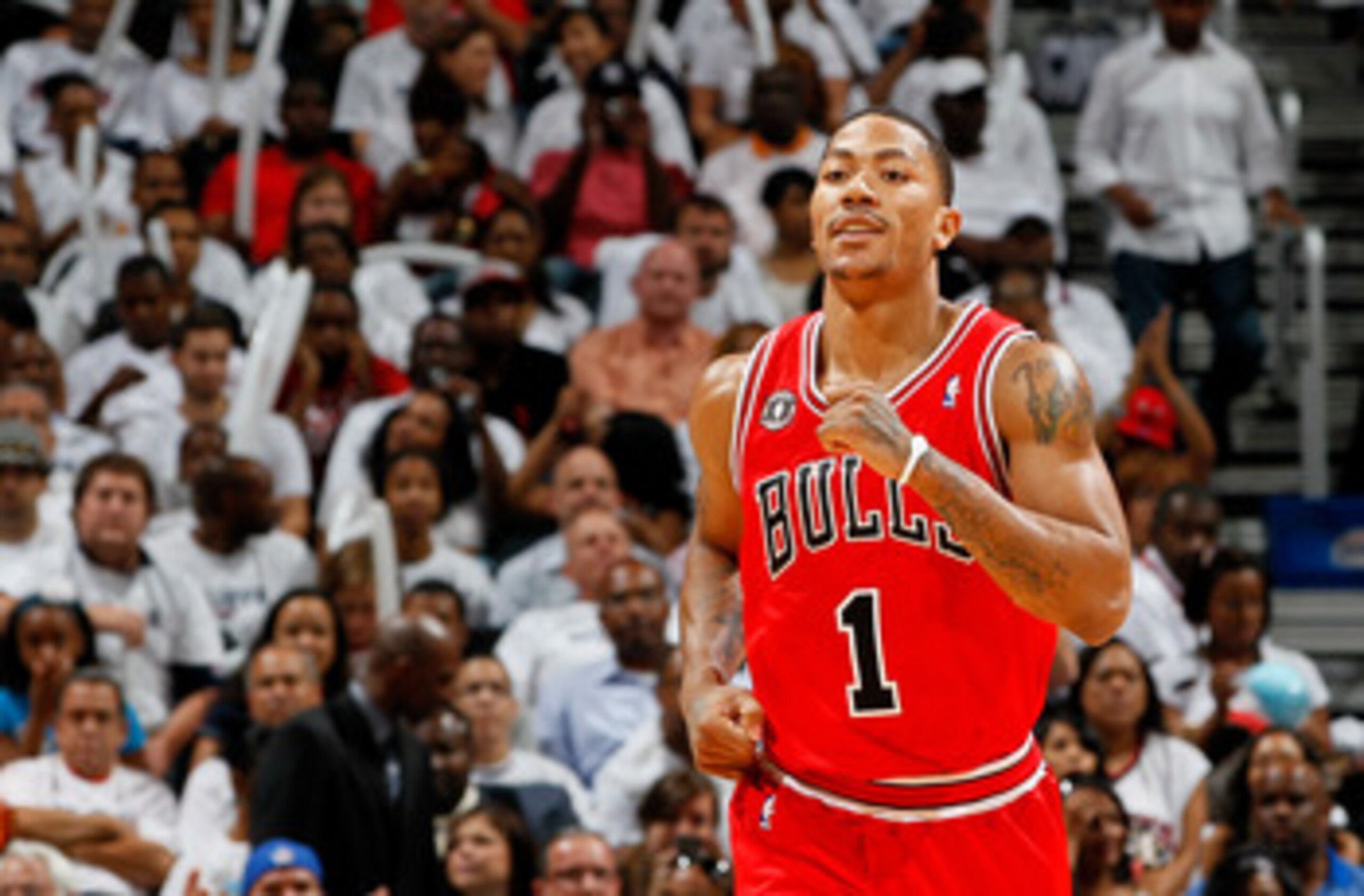 ATLANTA, GA - MAY 12:  Derrick Rose #1 of the Chicago Bulls reacts after scoring a basket against the Atlanta Hawks in Game Six of the Eastern Conference Semifinals in the 2011 NBA Playoffs at Phillips Arena on May 12, 2011 in Atlanta, Georgia.  NOTE TO U