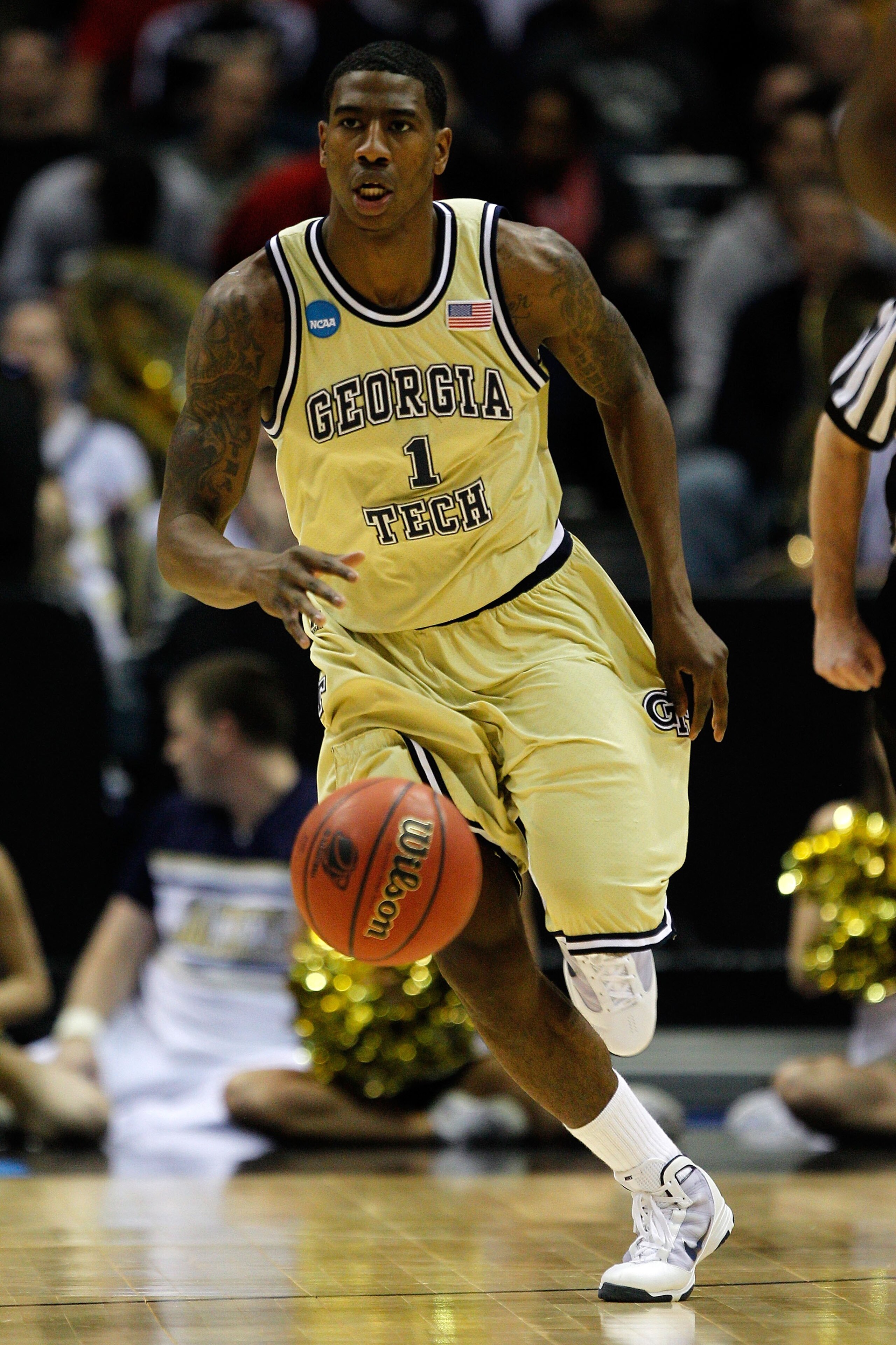 MILWAUKEE - MARCH 21: Iman Shumpert #1 of the Georgia Tech Yellow Jackets moves the ball against the Ohio State Buckeyes during the second round of the 2010 NCAA men's basketball tournament at the Bradley Center on March 21, 2010 in Milwaukee, Wisconsin. MILWAUKEE - MARCH 21: Iman Shumpert #1 of the Georgia Tech Yellow Jackets moves the ball against the Ohio State Buckeyes during the second round of the 2010 NCAA men's basketball tournament at the Bradley Center on March 21, 2010 in Milwaukee, Wisconsin.