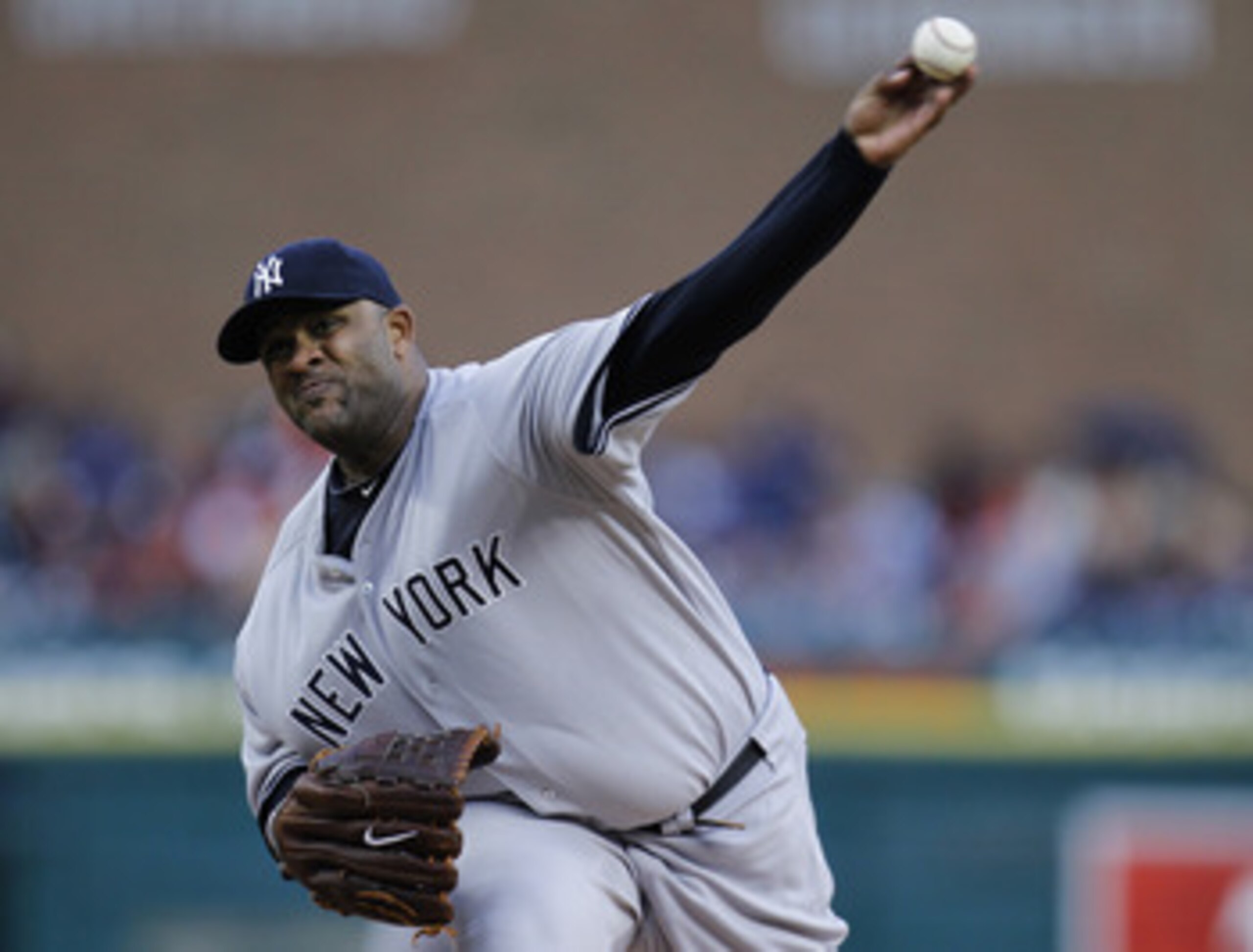 DETROIT, MI - MAY 03: CC Sabathia #52 of the New York Yankees throws a first inning pitch while playing the Detroit Tigers at Comerica Park on May 3, 2011 in Detroit, Michigan. (Photo by Gregory Shamus/Getty Images)
